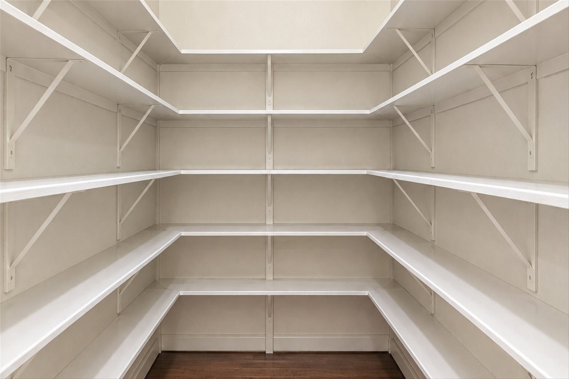1407 Trails Of Katy Lane, Katy, TX 77494 Room to stock up for the weekend gathering. The walk-in pantry features wraparound shelving that keeps ingredients, snacks and serving essentials organized and accessible, freeing the kitchen counters for the meals and moments ahead.