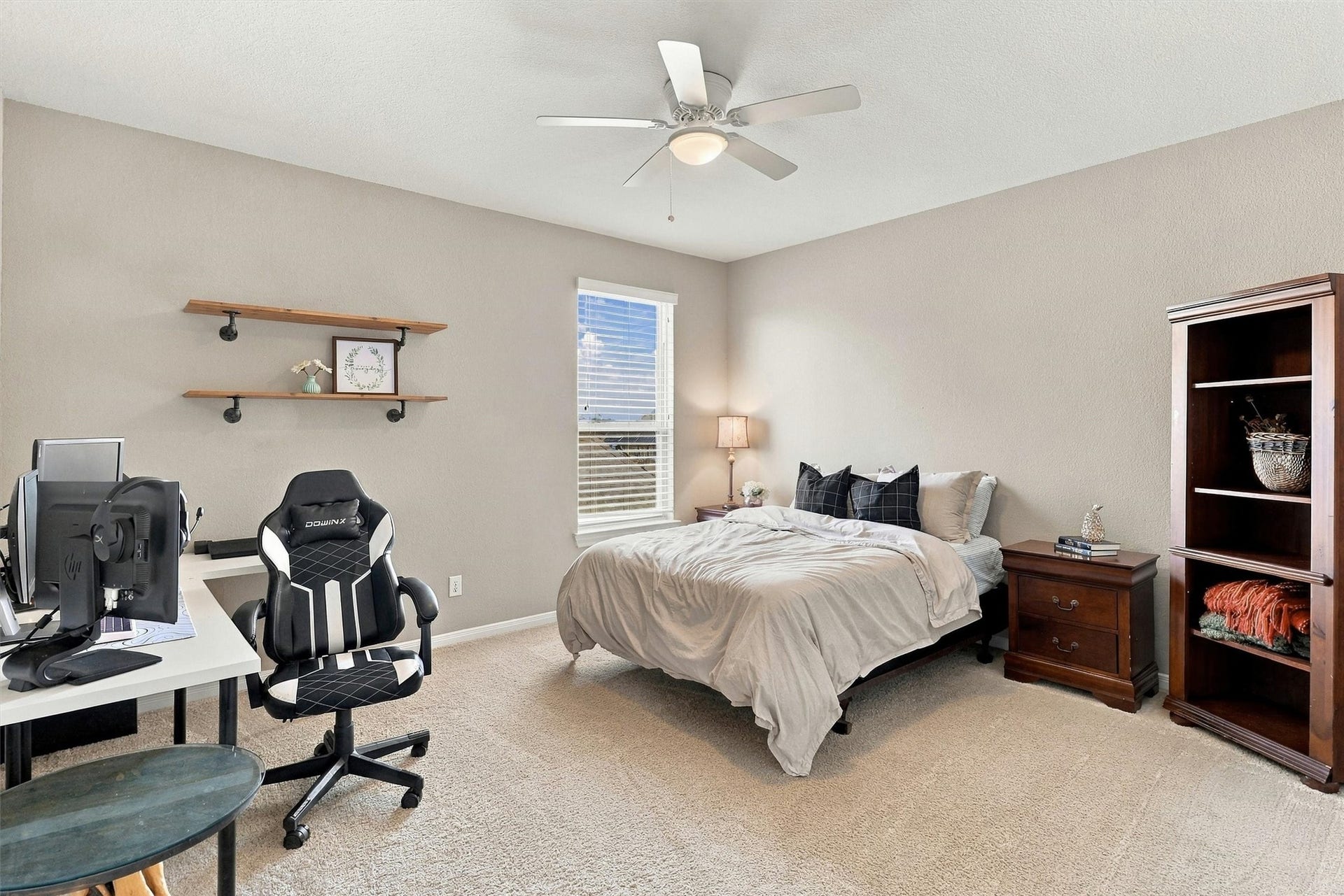 1407 Trails Of Katy Lane, Katy, TX 77494 Another spacious upstairs bedroom offers room to make it your own. Arrange a comfortable sleeping space with a desk or reading area, while the nearby game and media rooms provide separate destinations for recreation.
