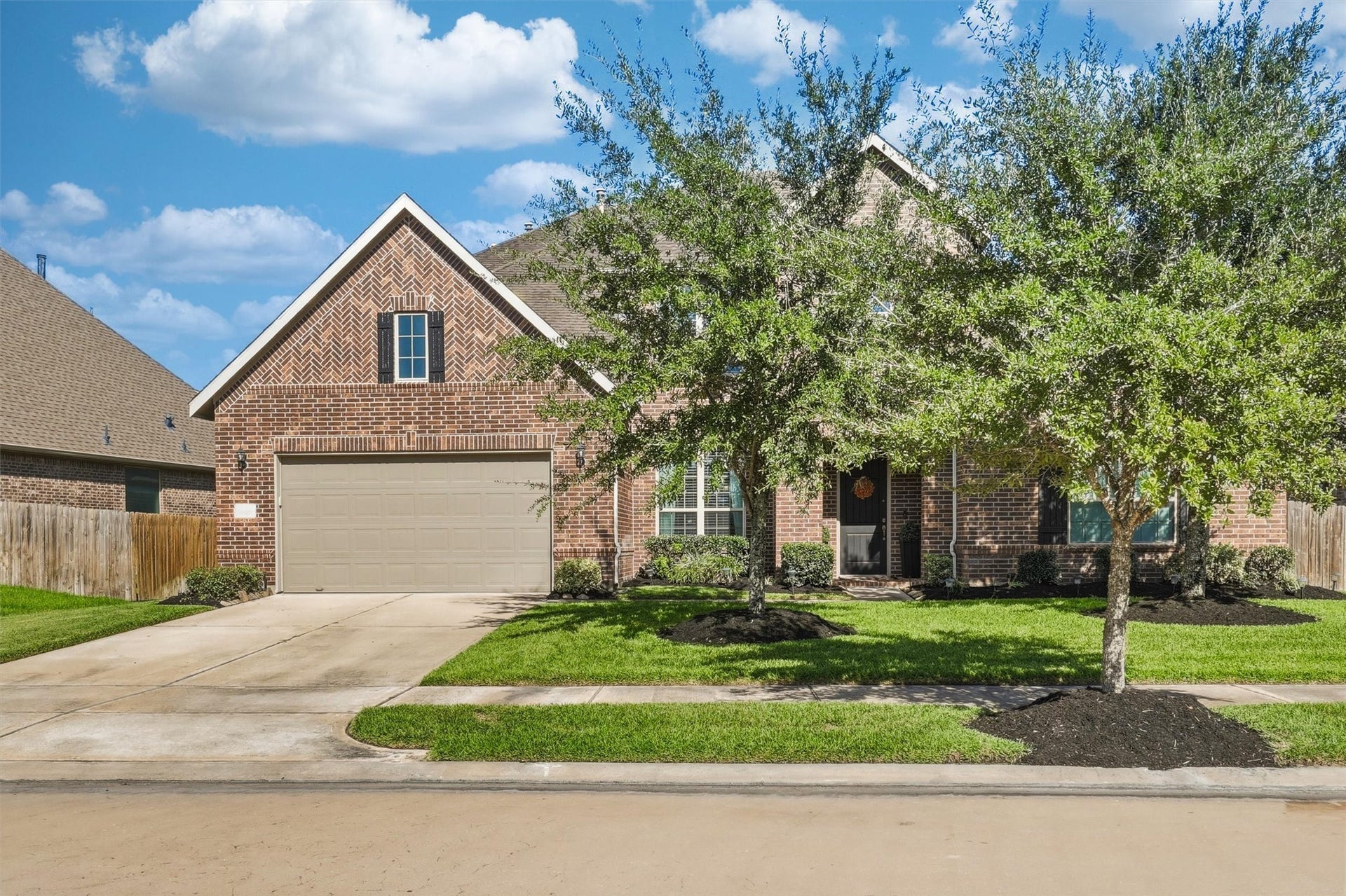 1407 Trails Of Katy Lane, Katy, TX 77494 A gracious brick exterior, mature landscaping and a three-car tandem garage welcome you home. Zoned to Katy ISD, with convenient access to I-10 and nearby Target, Lowes and Home Depot, this address brings everyday convenience to an inviting setting.