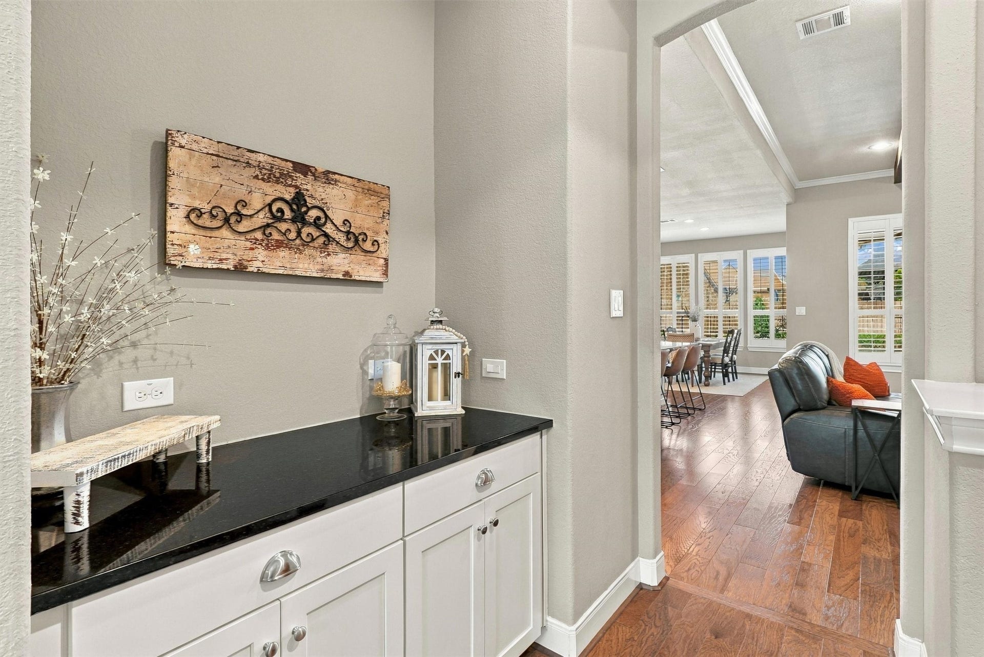 1407 Trails Of Katy Lane, Katy, TX 77494 Hosting feels easier with a serving area close at hand. This butlers pantry offers cabinetry and counter space for setting out refreshments, arranging dessert or keeping serving pieces ready between the kitchen and formal dining room.