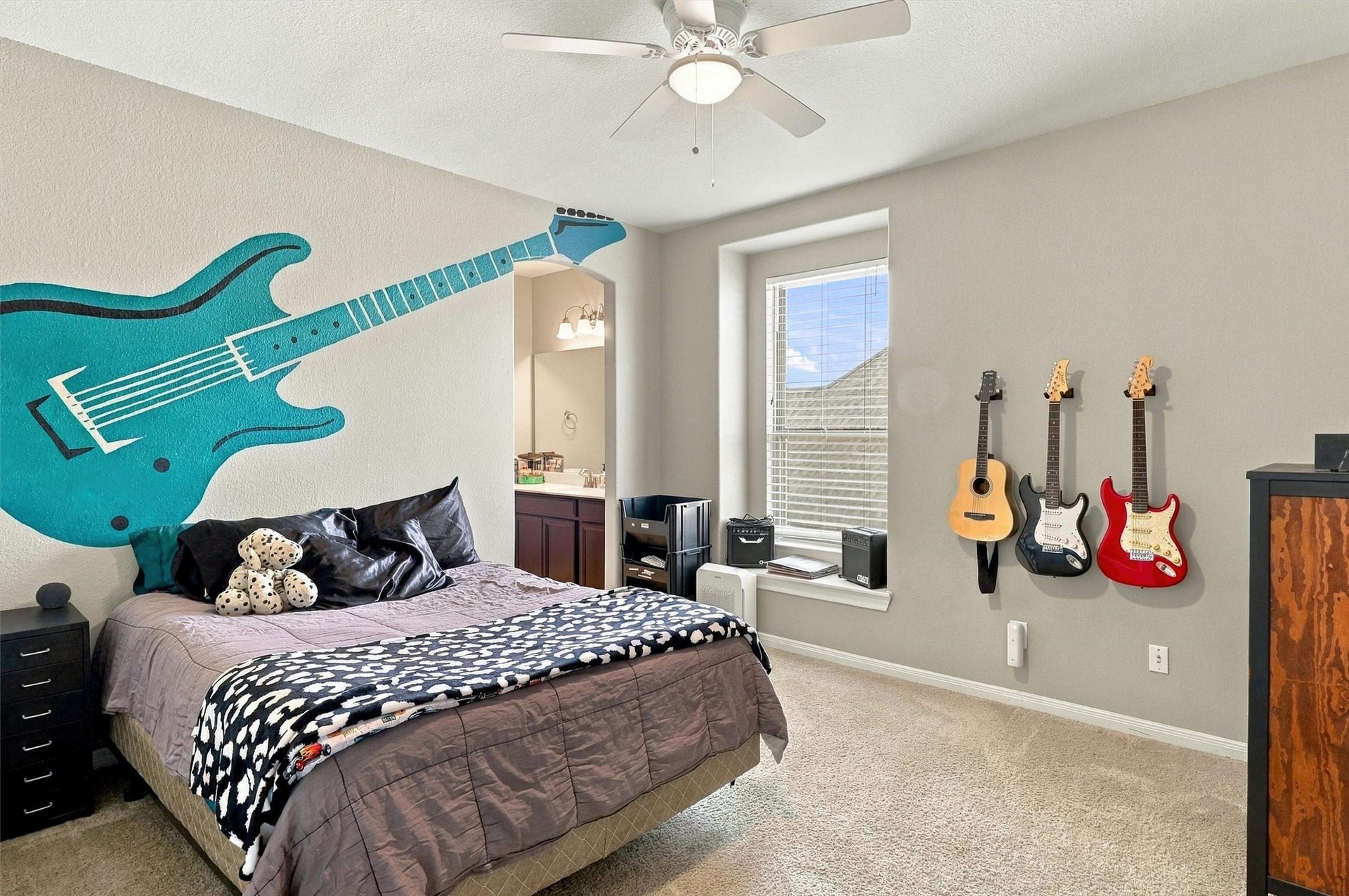 1407 Trails Of Katy Lane, Katy, TX 77494 A room with space to express yourself. This upstairs bedroom pairs natural light and a ceiling fan with room for a comfortable bed and your favorite furnishings. Imagine a personal retreat for quiet mornings, creative afternoons and a little music at the end of the day.