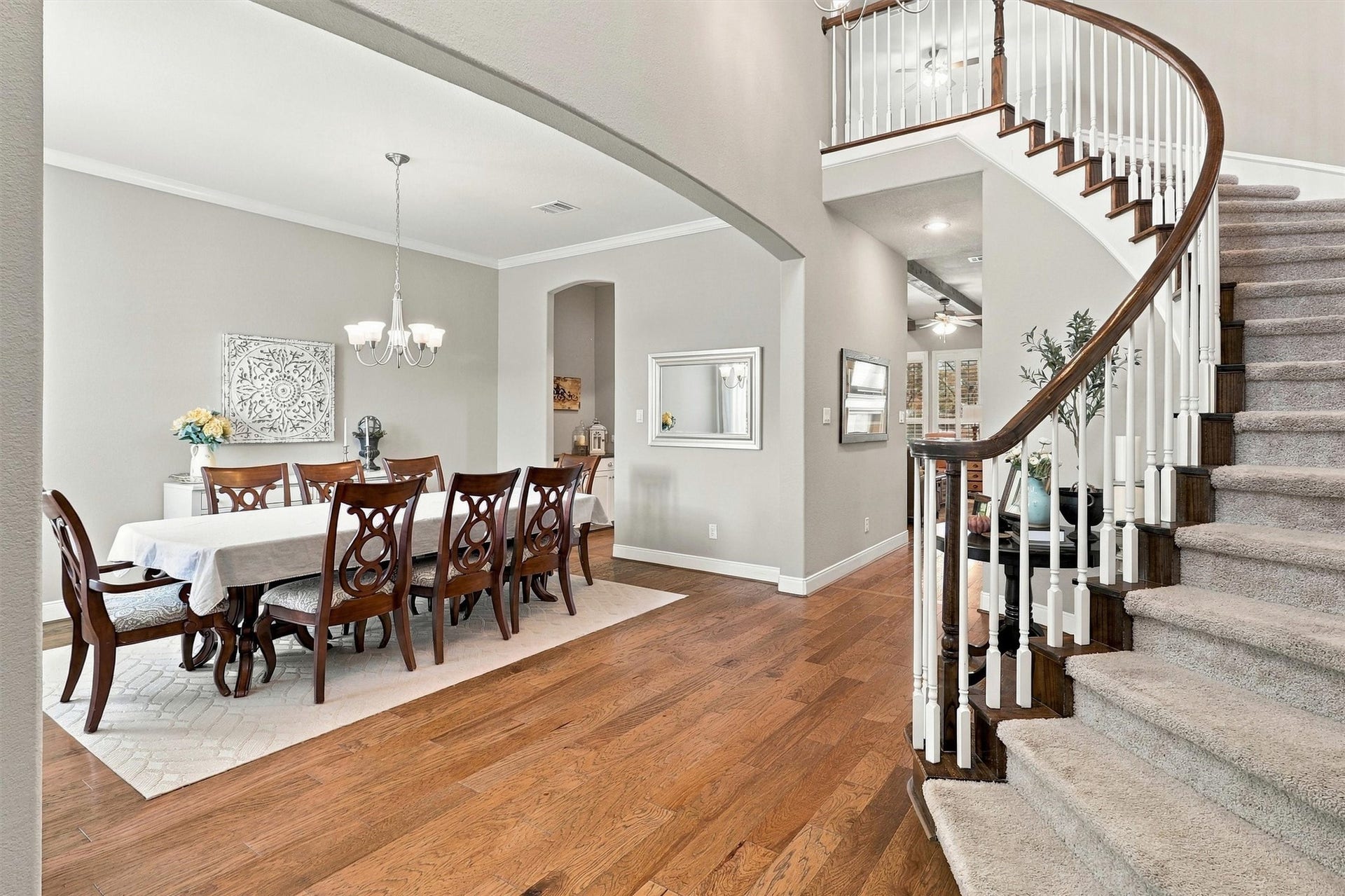 1407 Trails Of Katy Lane, Katy, TX 77494 Open the door to a sweeping staircase, warm wood flooring and a foyer that makes an impression. The formal dining room sits just off the entry, setting the stage for celebrations that begin with a beautiful welcome.