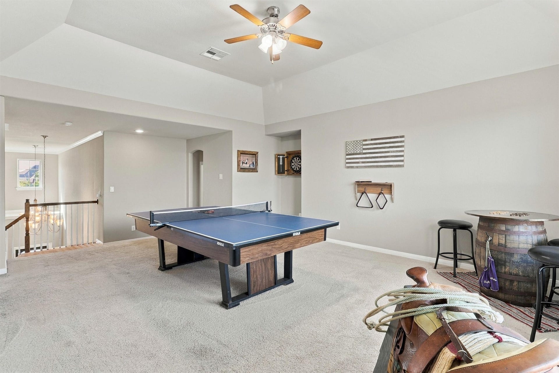 1407 Trails Of Katy Lane, Katy, TX 77494 Let the friendly competition begin. The spacious upstairs game room offers a dedicated destination for game nights and casual entertaining, keeping the fun going while the main-floor living spaces remain available for another gathering.