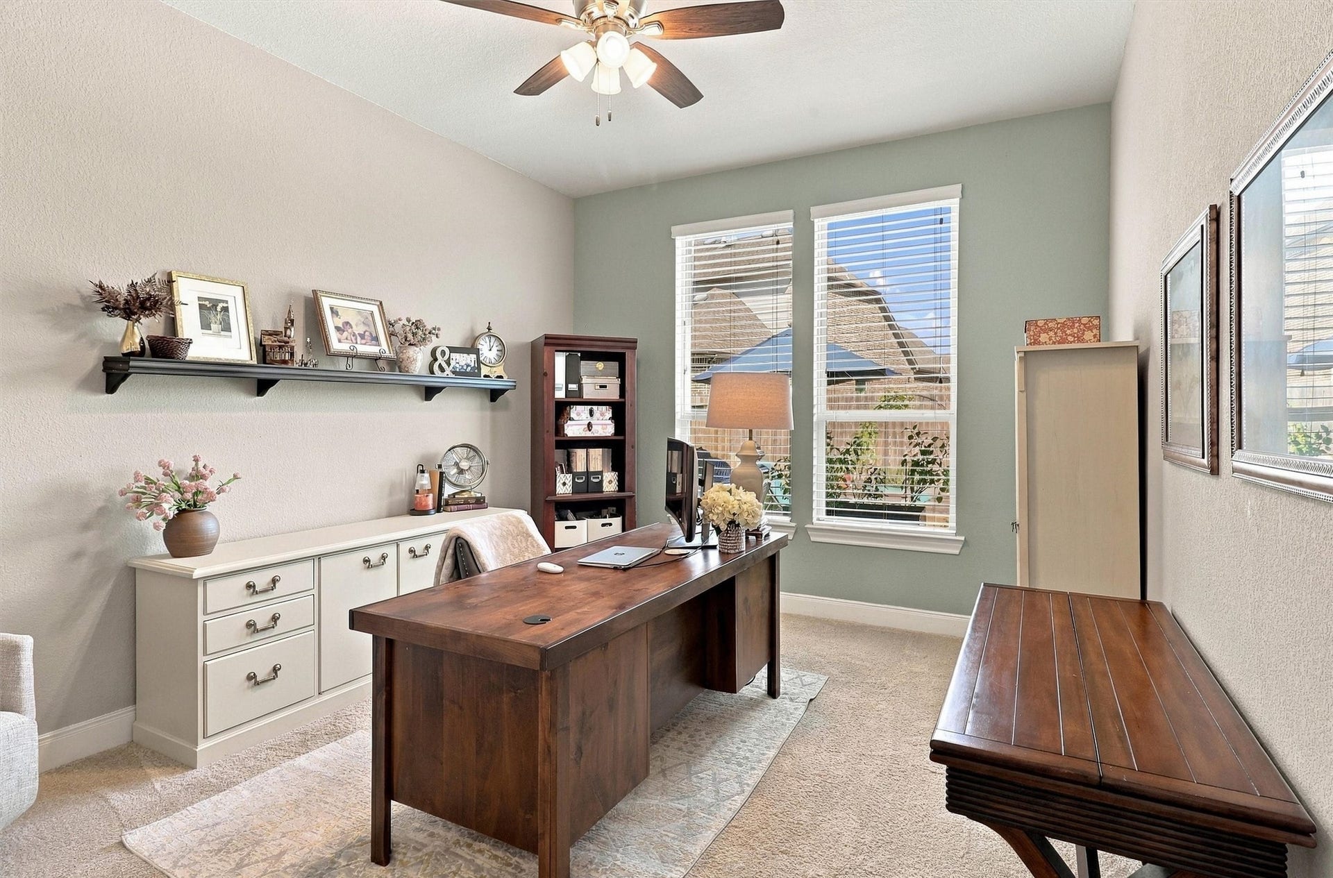 1407 Trails Of Katy Lane, Katy, TX 77494 A downstairs secondary bedroom adds valuable flexibility to the floor plan. Currently arranged as a workspace, this room offers options for overnight guests or a dedicated place to focus, with a full bathroom nearby.