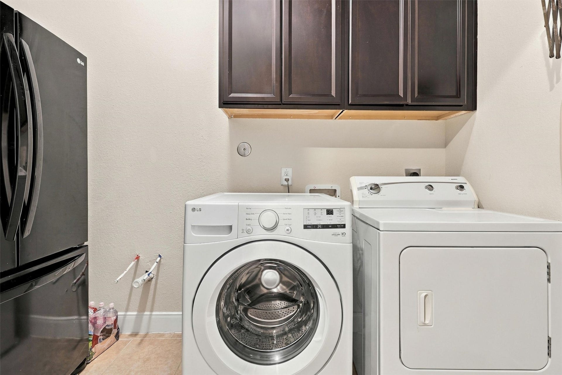 1407 Trails Of Katy Lane, Katy, TX 77494 Even the hardworking rooms have a place in the story. The utility room includes overhead cabinetry and plumbing for a future sink, offering useful storage and workspace for laundry, cleanup and the tasks that support everyday life.