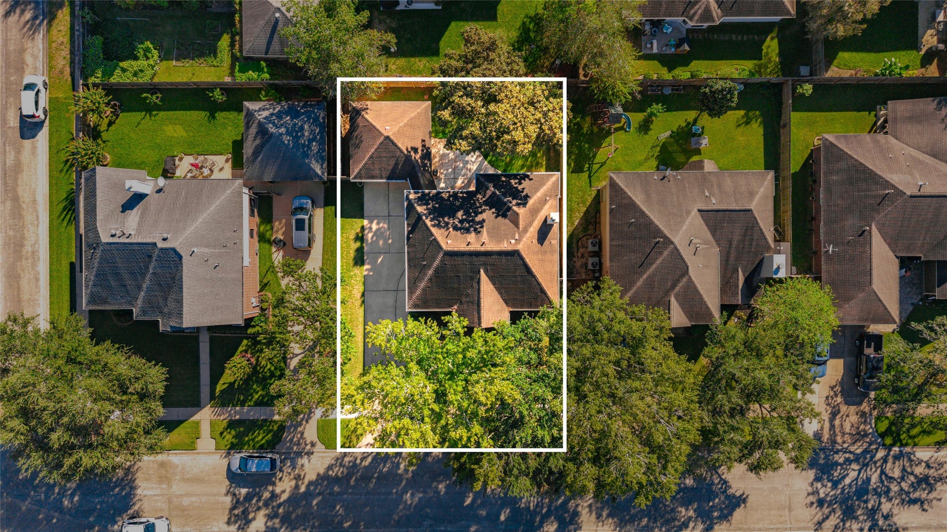 1344 Coleman Boylan Drive, League City, TX 77573 Charming home nestled in a lush neighborhood setting, offering ample privacy and a spacious yard.