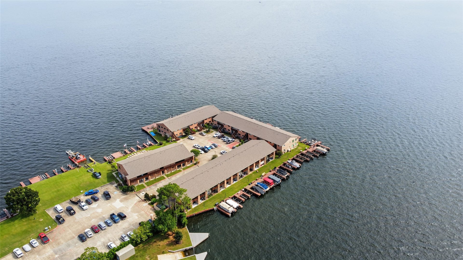 Aerial view identifying the condominium's location within the waterfront community.