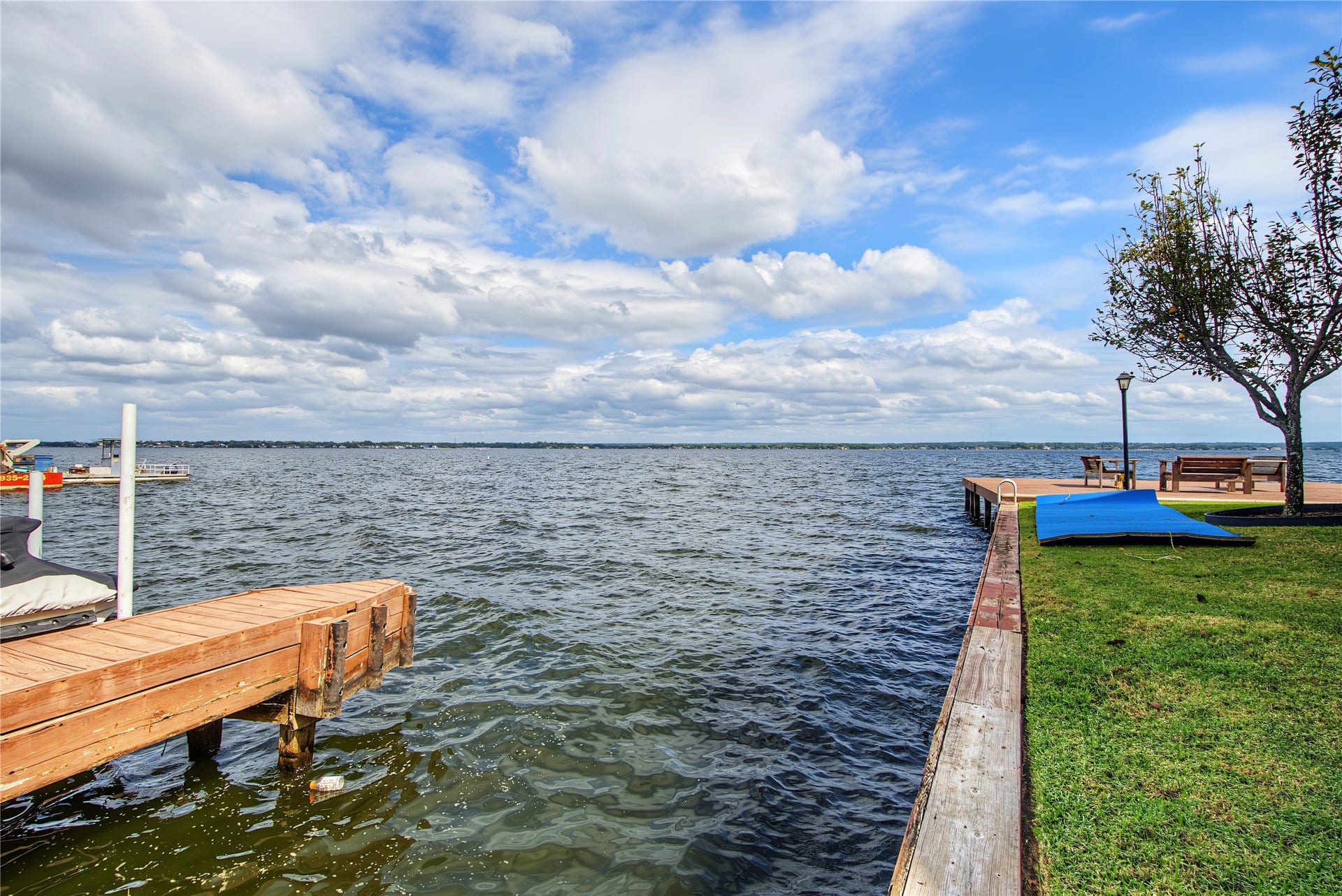 Enjoy beautiful open-water views of Lake Conroe and convenient access to waterfront boating.
