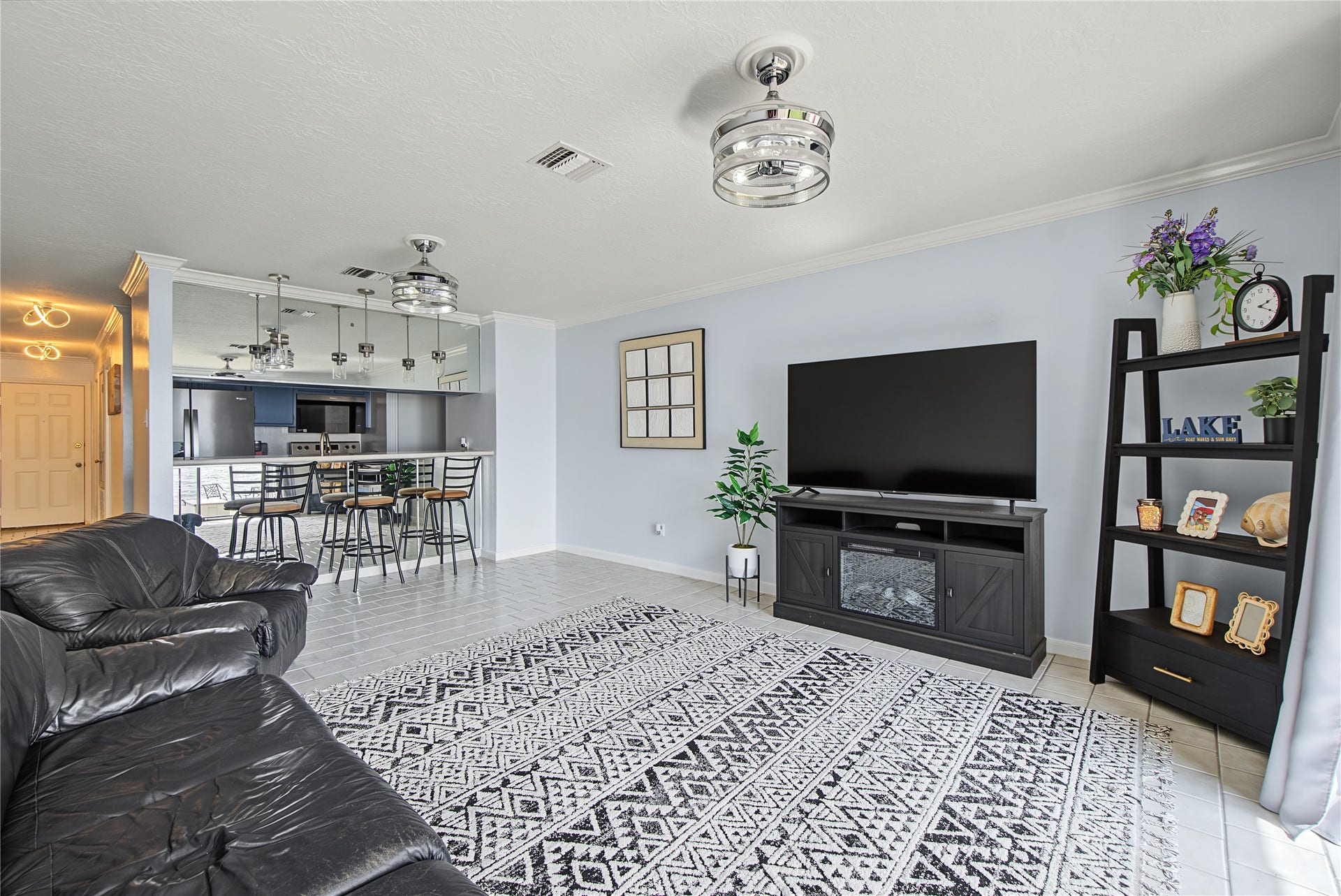 Spacious living area offers flexibility for entertaining, relaxing, and enjoying waterfront living.
