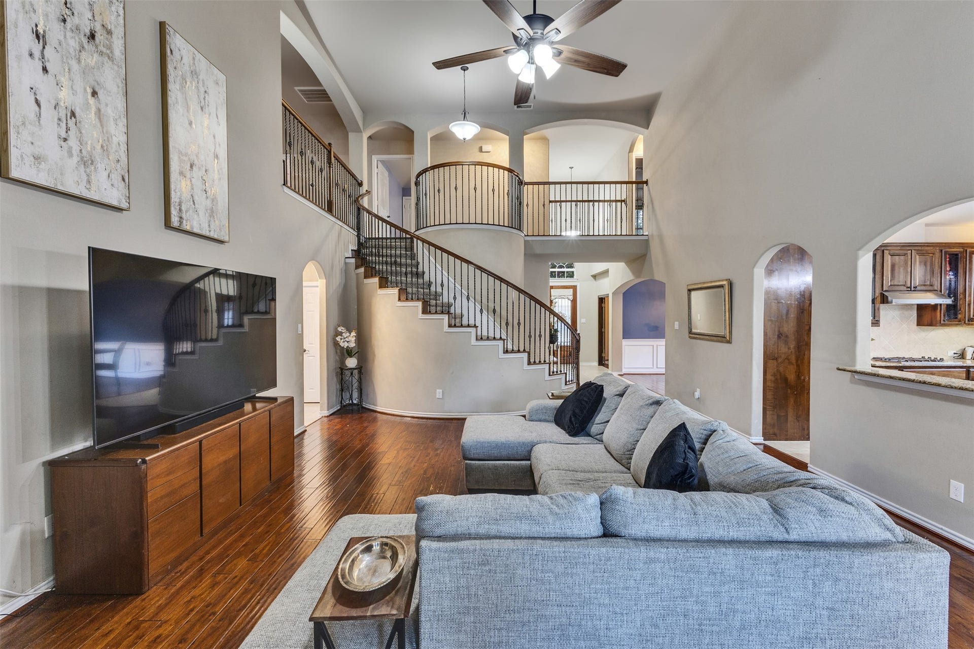 From movie nights to relaxing weekends, this spacious family room is designed for making memories.