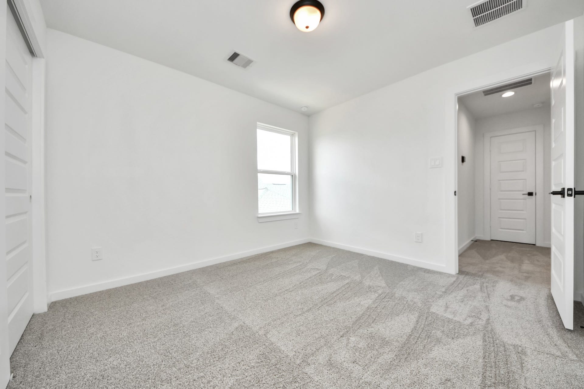 5914 Fox Peak Lane, Richmond, TX 77469 Generously sized secondary bedrooms featuring spacious closets, soft and inviting carpeting underfoot, large windows allowing plenty of natural light, and the added touch of privacy blinds for your personal retreat. Sample photo of completed home with similar floor plan. Actual colors and selections may vary.