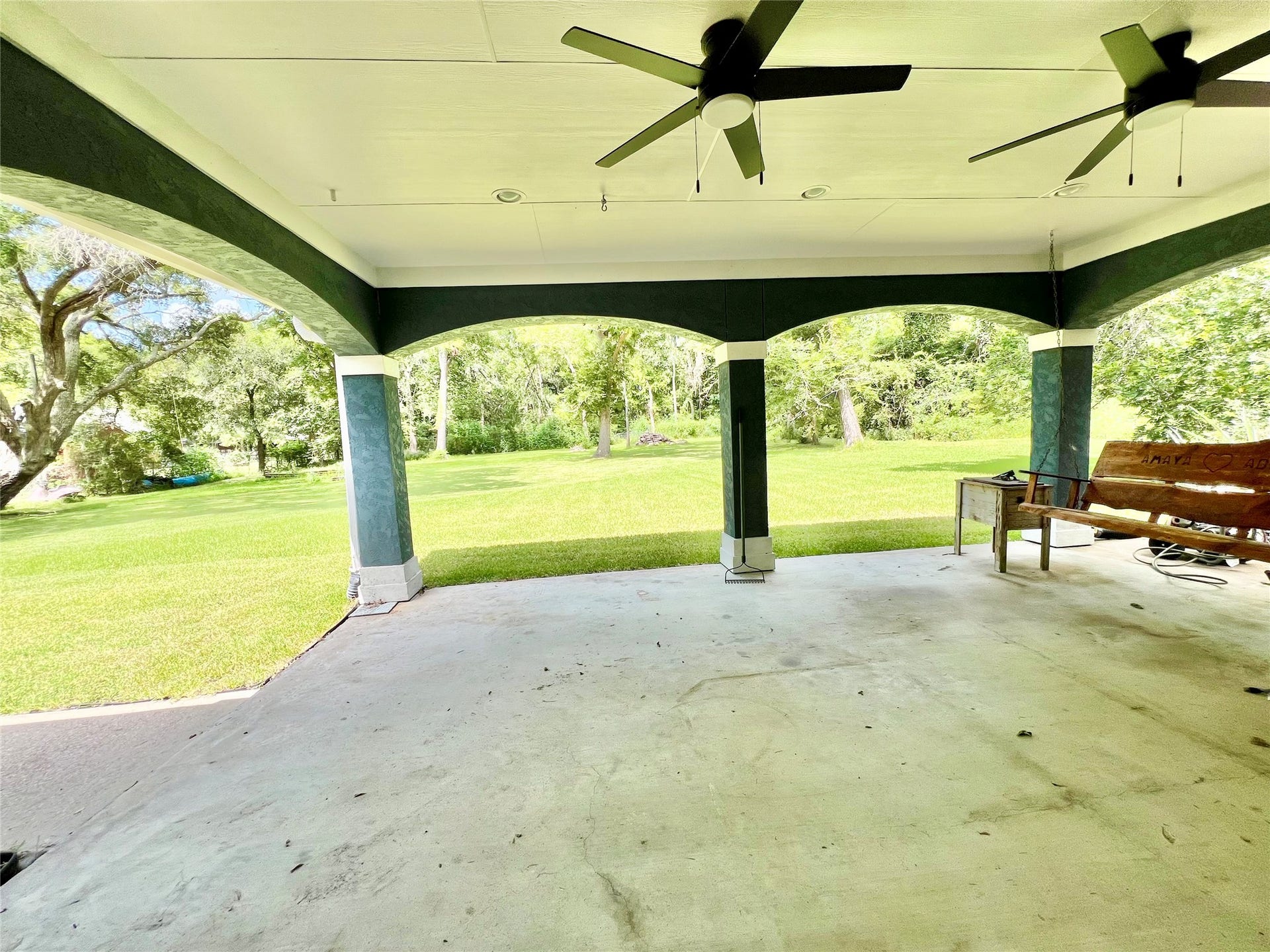 6714 Jay Road Road, Hitchcock, TX 77563 Massive Covered Back Patio spans the width of the home in the back.