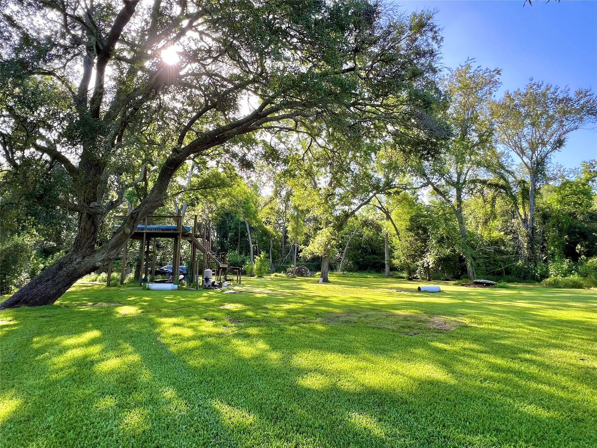 6714 Jay Road Road, Hitchcock, TX 77563 So much room for a garden, green house, playground equipment, another shop...you name it!