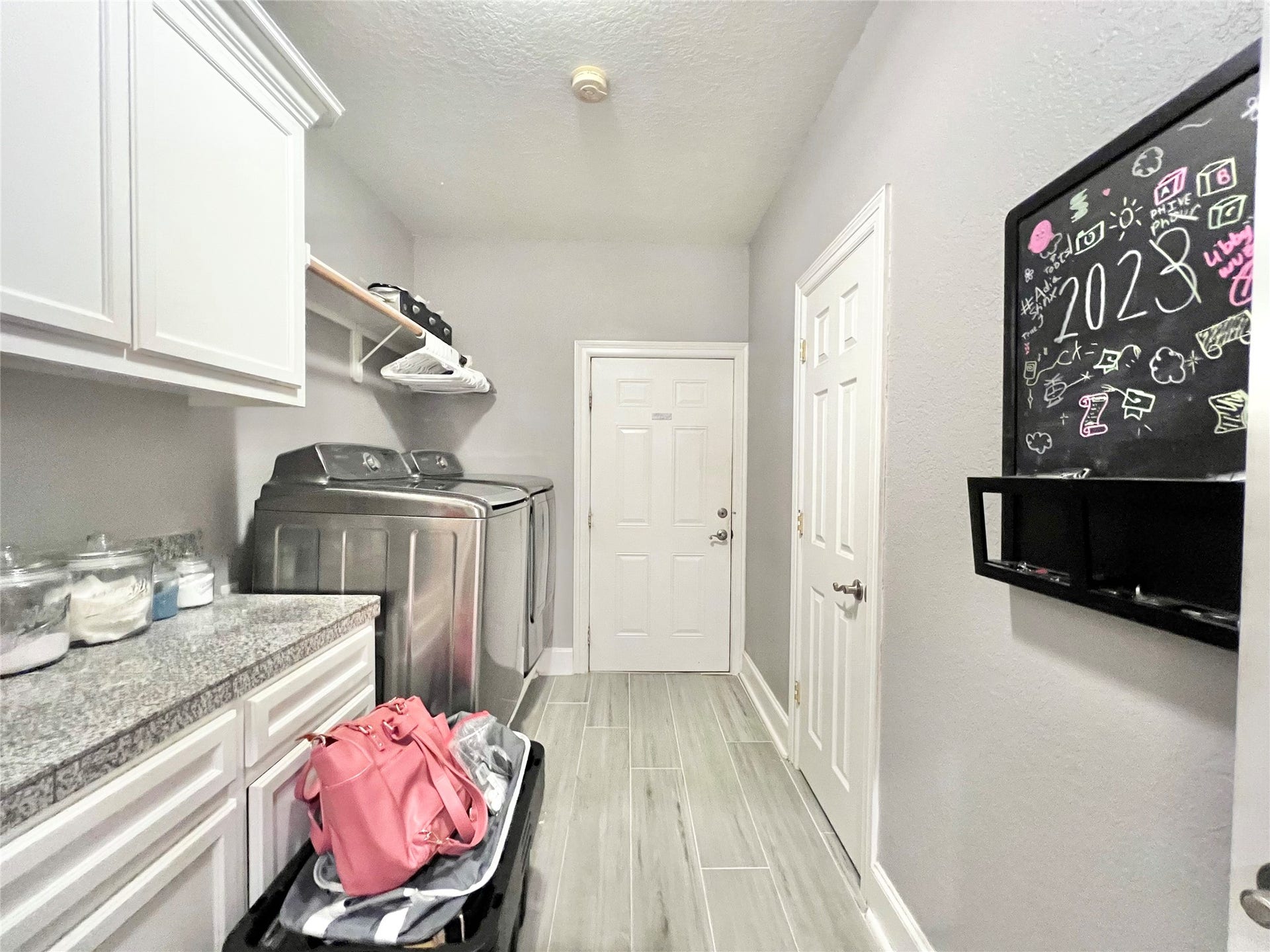 6714 Jay Road Road, Hitchcock, TX 77563 Back downstairs in the multipurpose mud/utility room