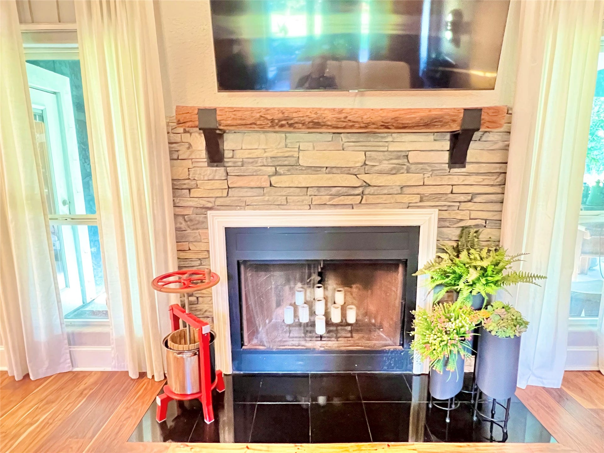 6714 Jay Road Road, Hitchcock, TX 77563 Fireplace anchors a Great focal point in living and entertaining area