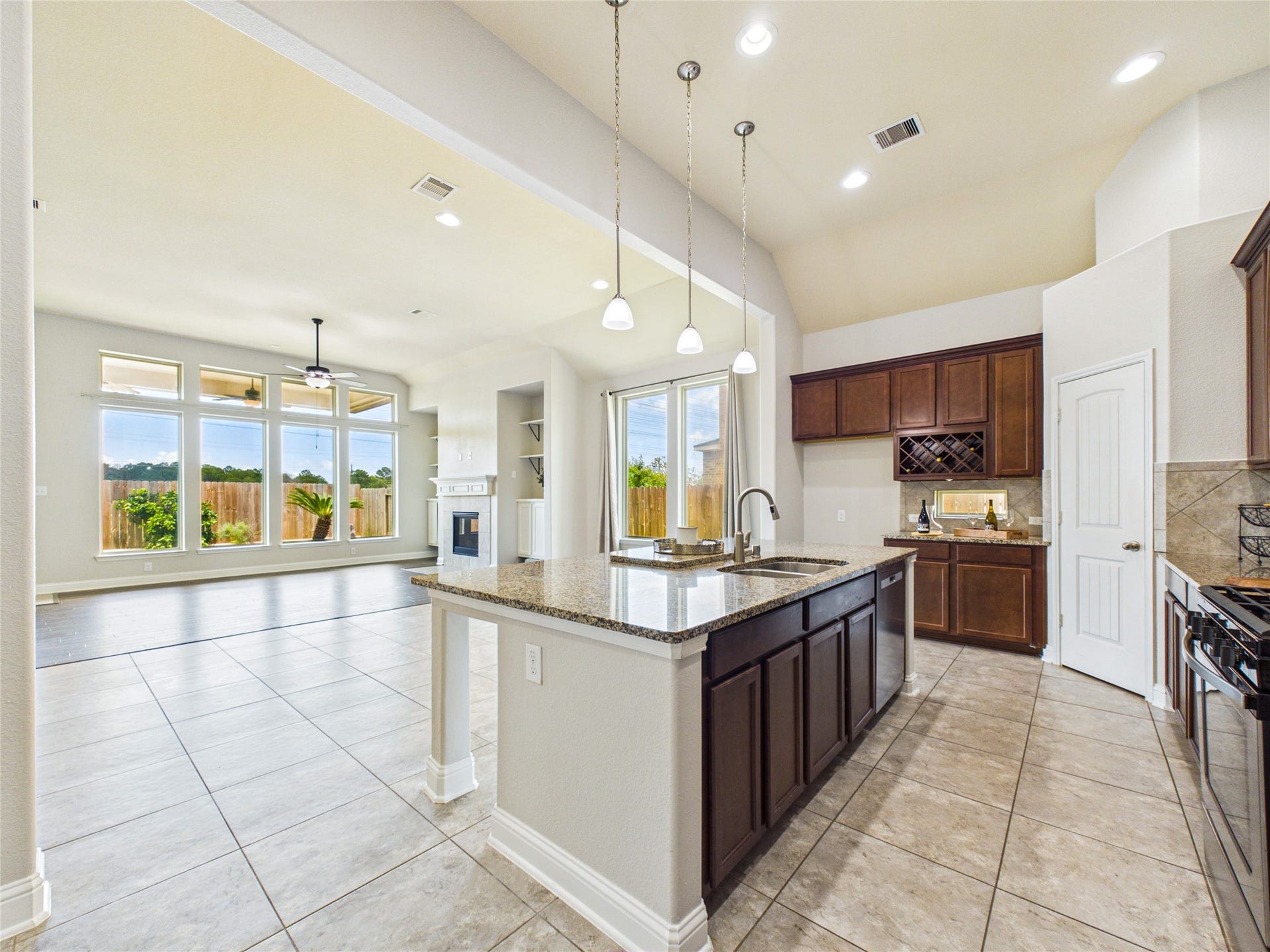 2135 Llerena Lane, League City, TX 77573 The kitchen overlooks the dining area and living area.