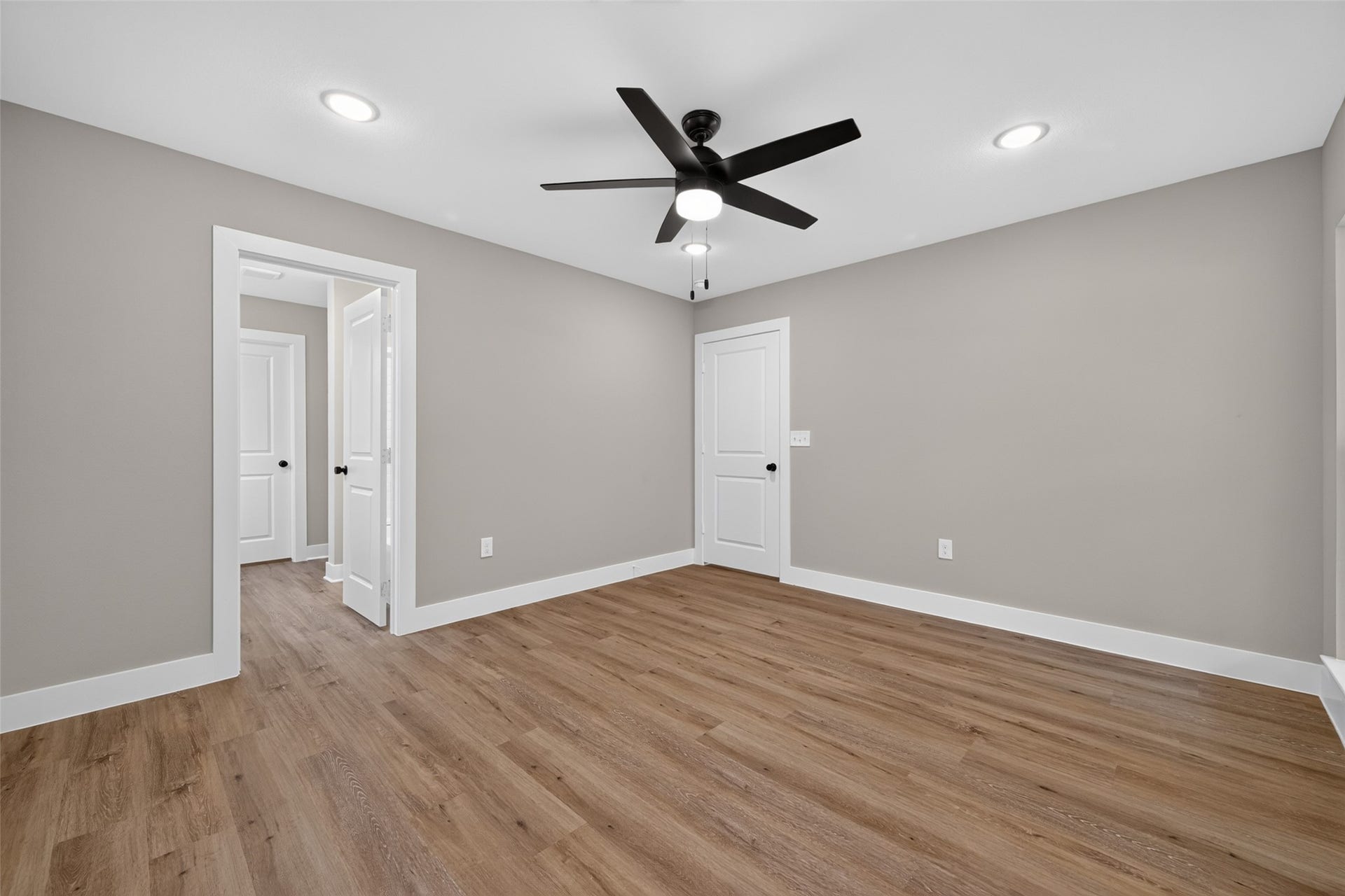1060 Mann Road, #A, Conroe, TX 77303 Master bedroom has walk in closet and en-suite bathroom.