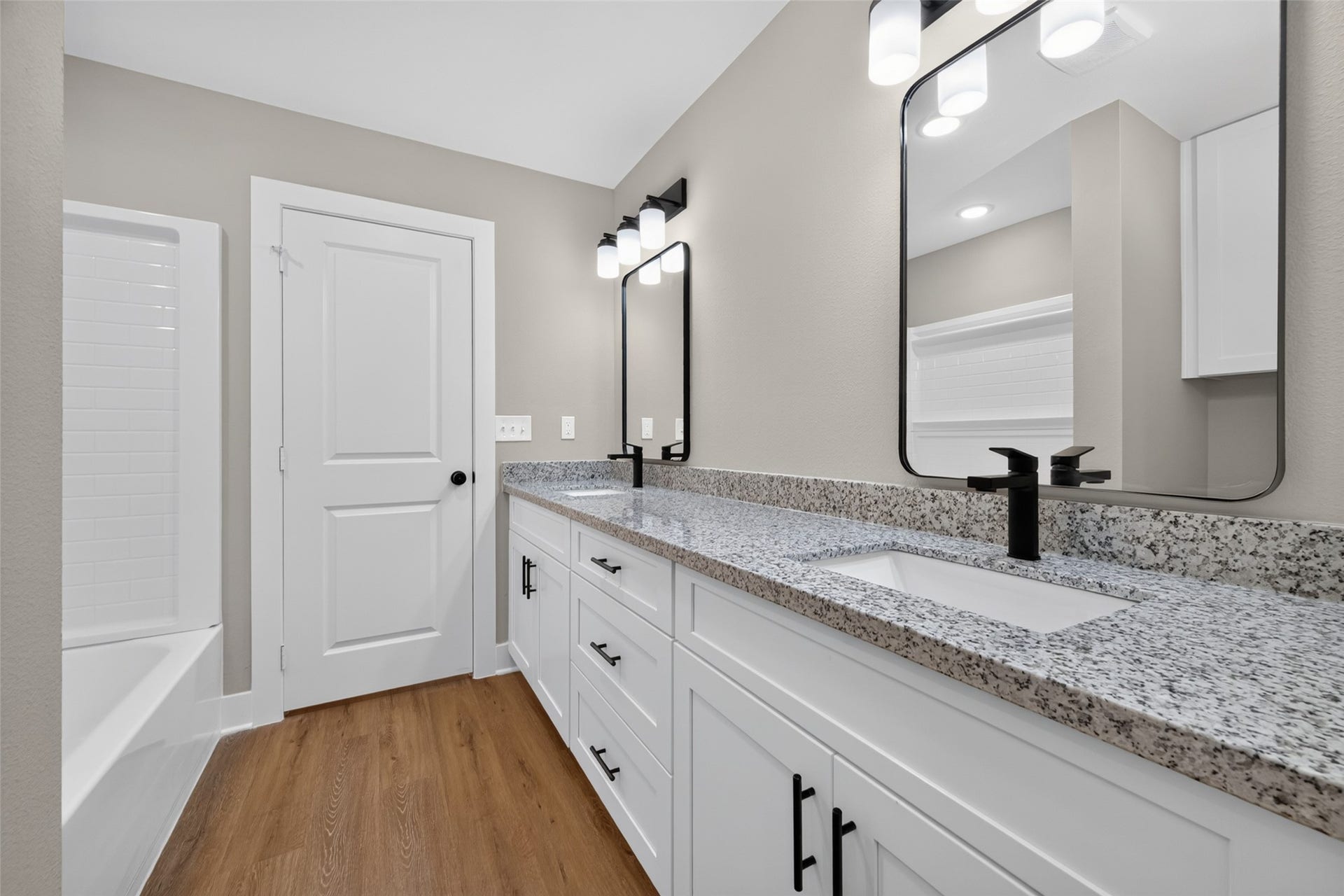1060 Mann Road, #A, Conroe, TX 77303 Master bathroom has shower/tub combo.