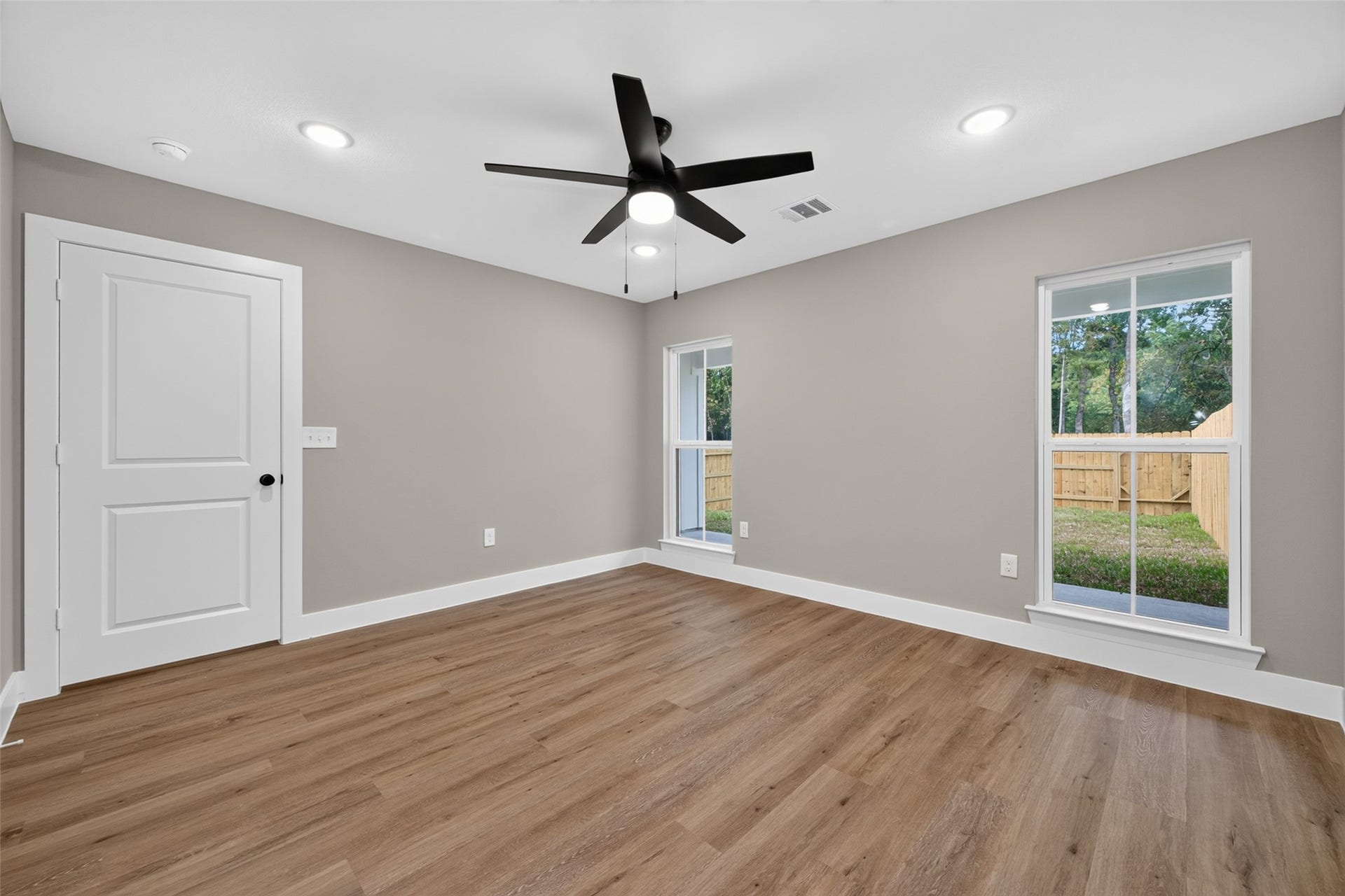 1060 Mann Road, #A, Conroe, TX 77303 Master bedroom is located the farthest from the living room/kitchen area.