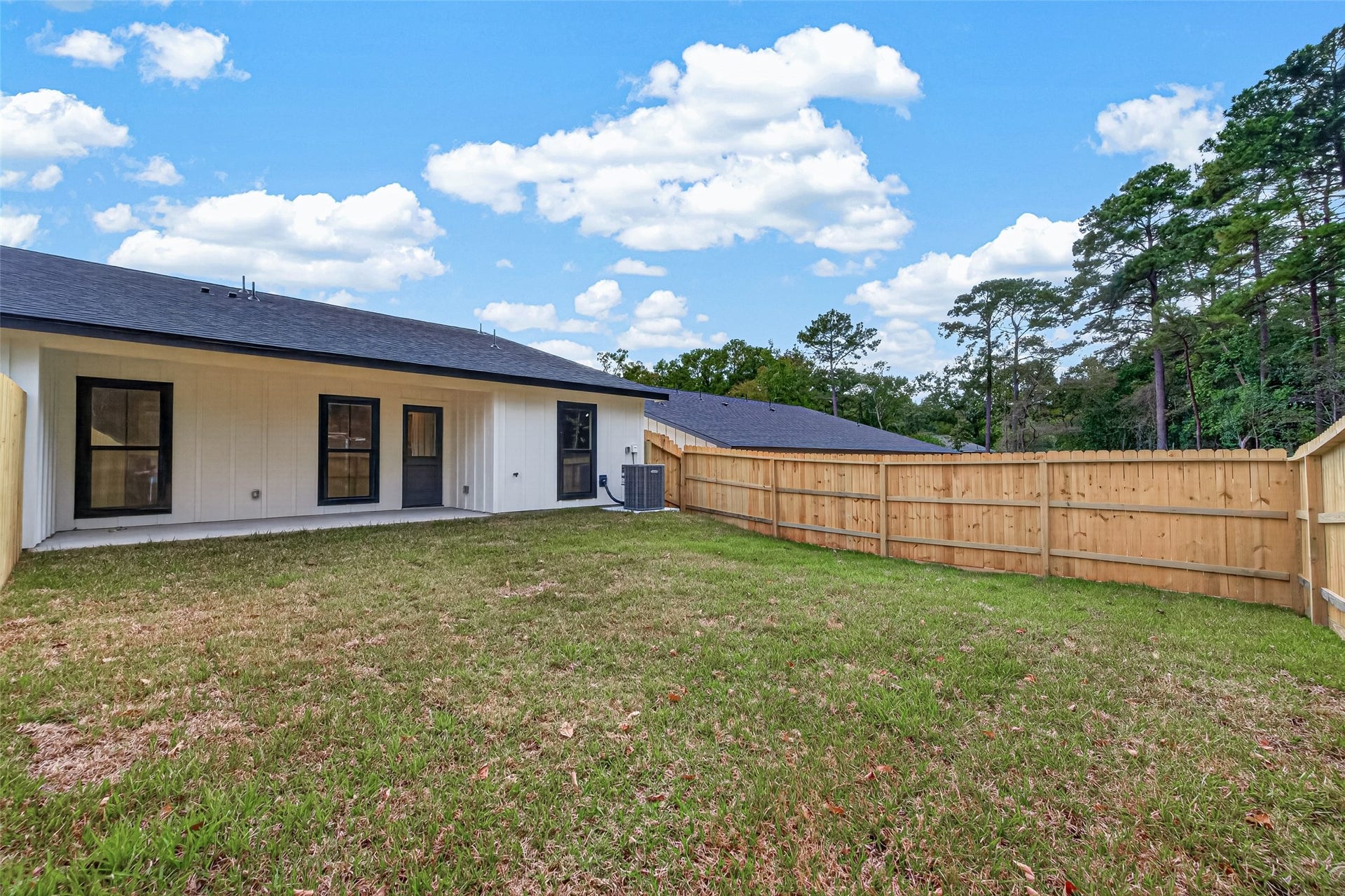 1060 Mann Road, #A, Conroe, TX 77303 Fenced in backyard.