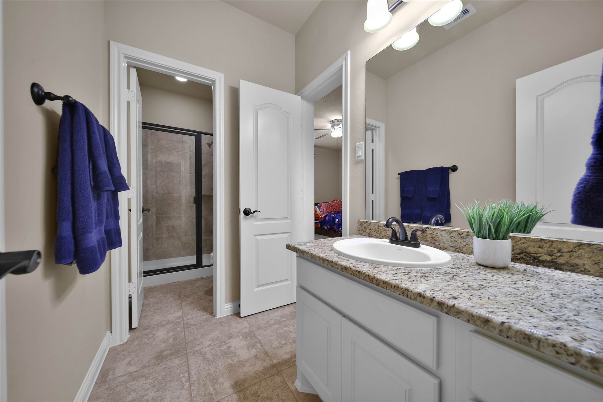27707 Lakeway Trail Lane, Fulshear, TX 77441 The adjoining bath features an ideal walk-in shower!