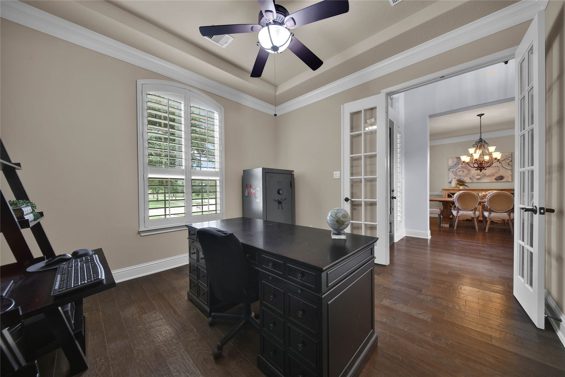 27707 Lakeway Trail Lane, Fulshear, TX 77441 French doors provide added privacy and a quiet workspace, making working from home both comfortable and productive.