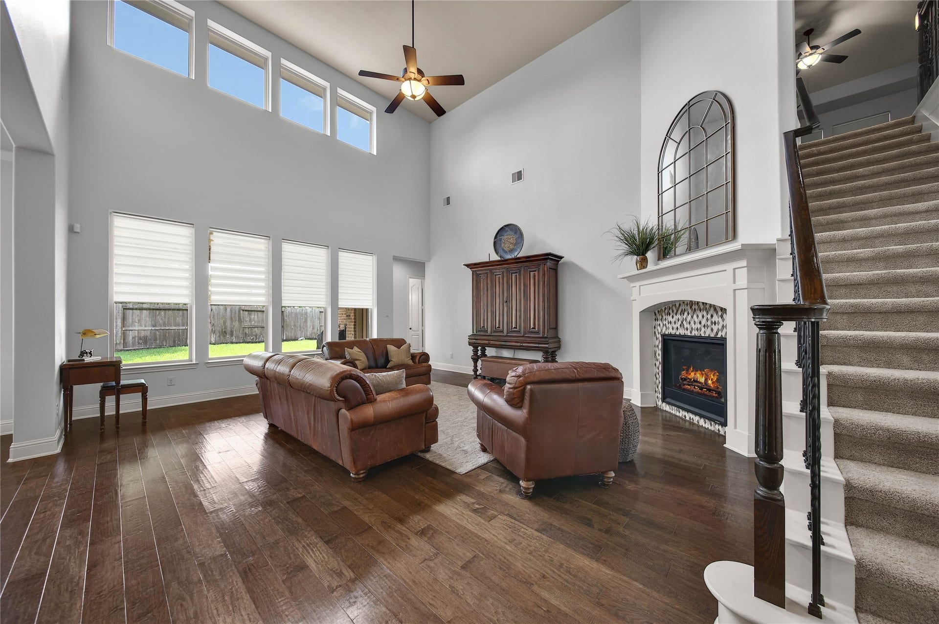 27707 Lakeway Trail Lane, Fulshear, TX 77441 The heart of the home. Rich, wood floors warm the Entry, Study, Living and Dining areas.