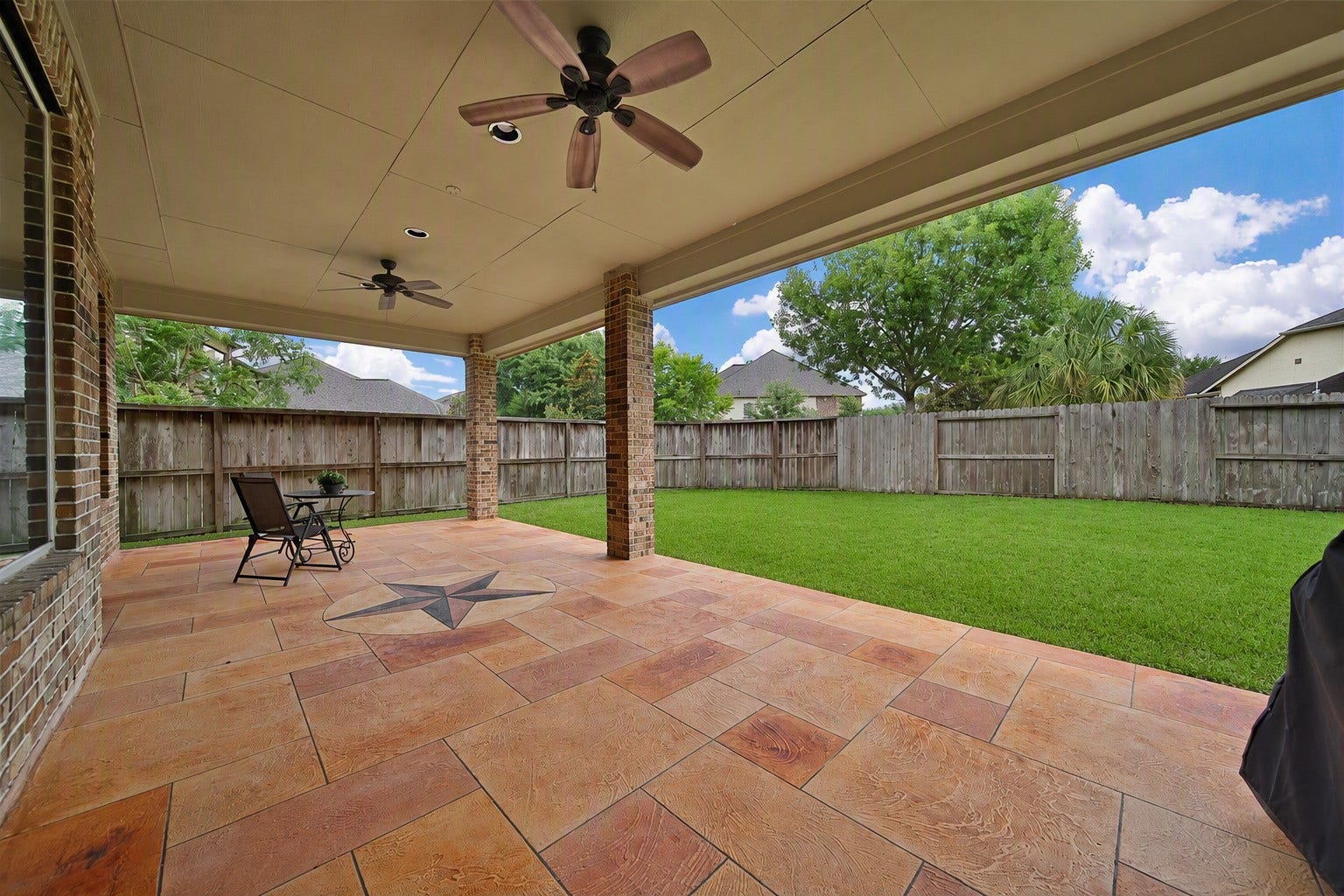 27707 Lakeway Trail Lane, Fulshear, TX 77441 AI Version: Seller is happy to remove flagstone/ rocks and resod the backyard with grass if a buyer prefers.