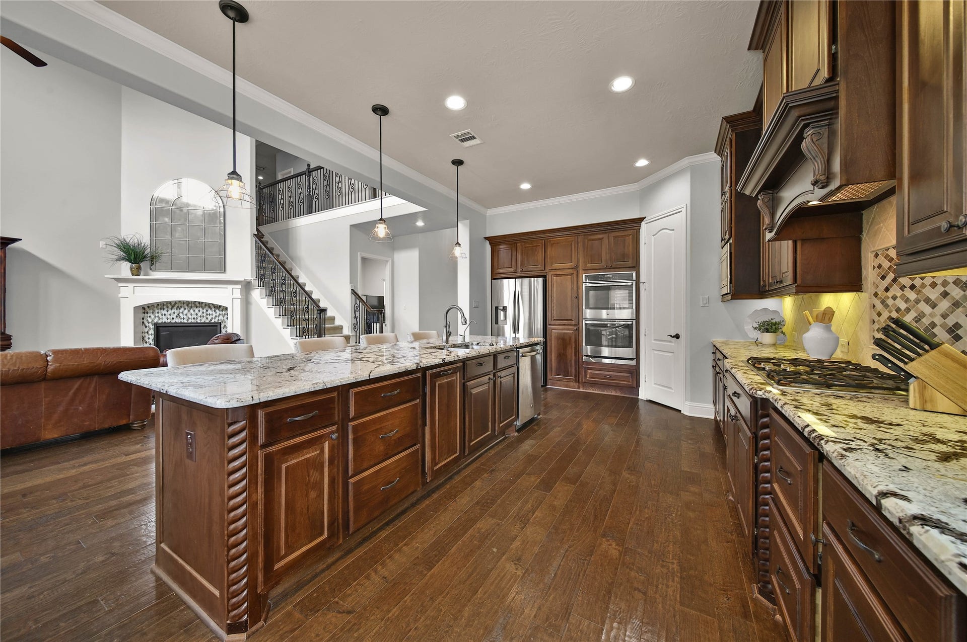 27707 Lakeway Trail Lane, Fulshear, TX 77441 Ample countertop and prep space! Walk In Pantry has built in spice rack on door.