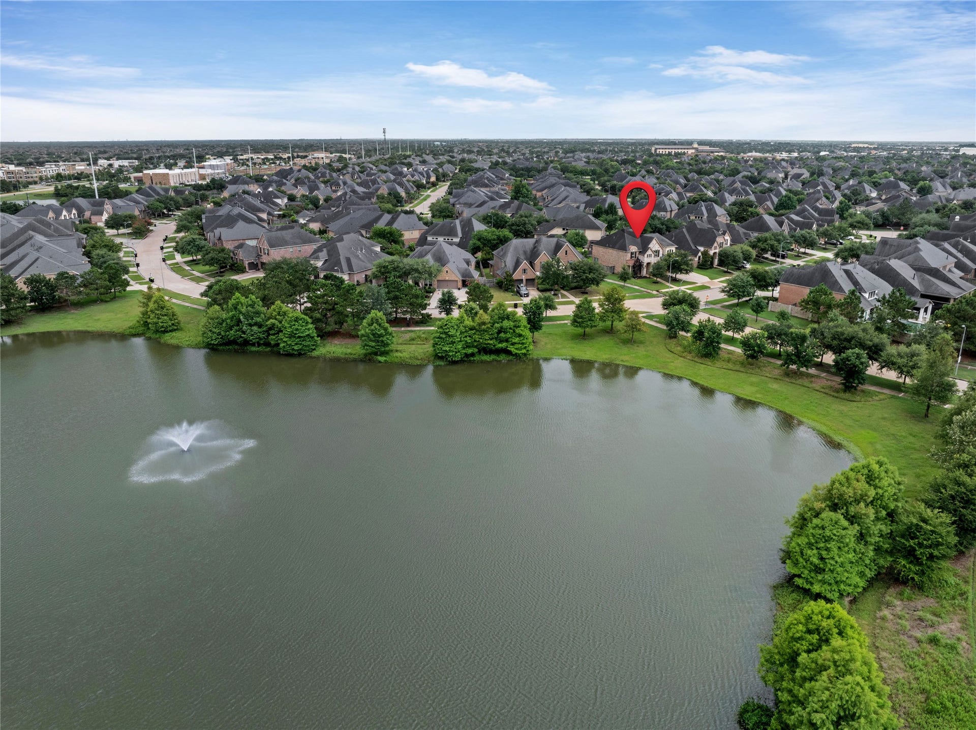 27707 Lakeway Trail Lane, Fulshear, TX 77441 Just outside your front door, you'll be greeted by a beautiful lake across the street, creating a peaceful and picturesque setting to enjoy each day.