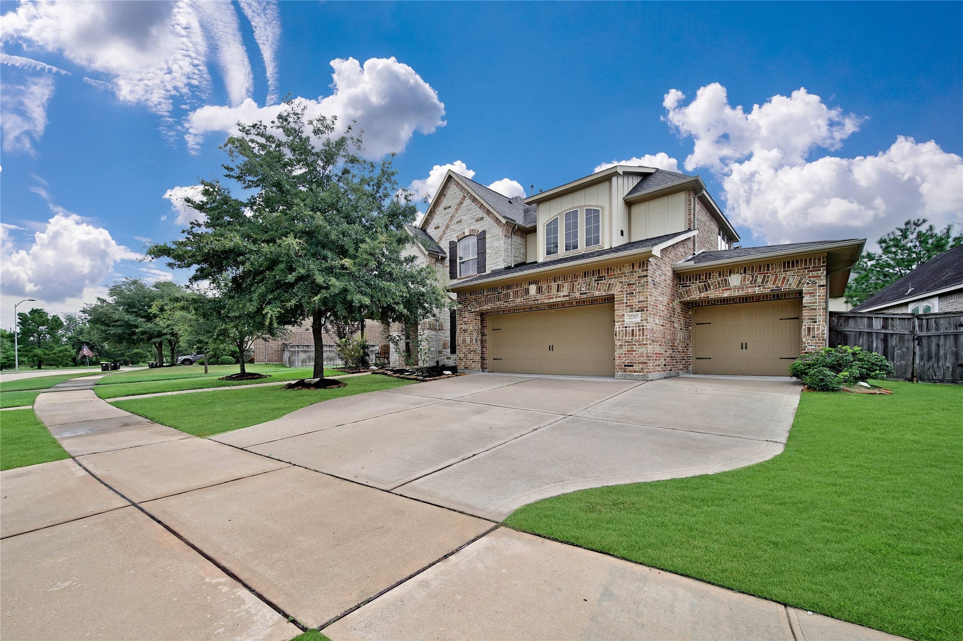27707 Lakeway Trail Lane, Fulshear, TX 77441 One of the standout features of this home is the oversized 5-car tandem garage, complete with a built-in workbench. Whether you need space for vehicles, hobbies, tools, or extra storage, you'll appreciate the abundance of room and versatility it offers.
