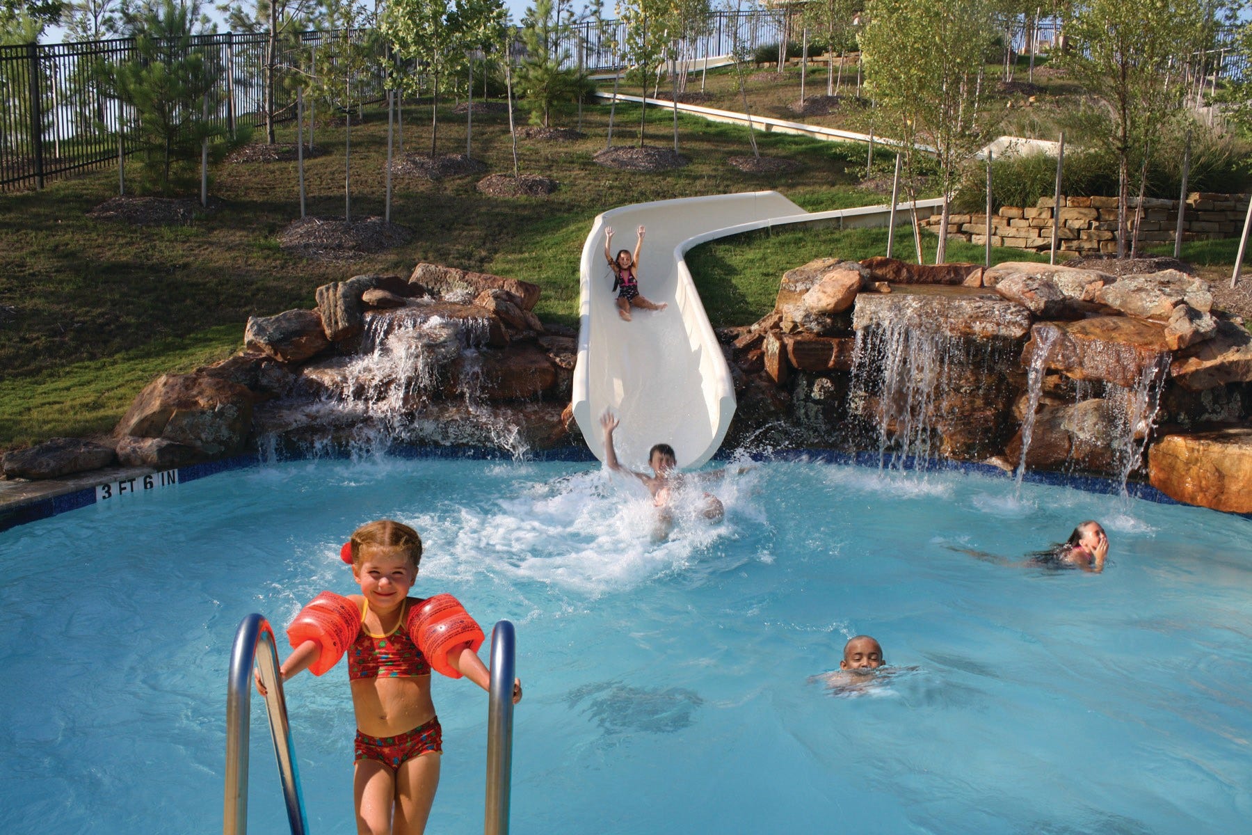 27707 Lakeway Trail Lane, Fulshear, TX 77441 From swimming laps to sliding down our 140-foot water slide, soak up fun in the sun at our four pool complexes.