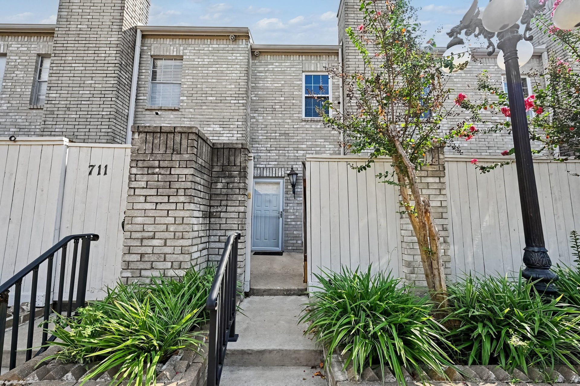 4001 Tanglewilde Street, #712, Houston, TX 77063 Front Fence Entrance - Faces Tanglewilde