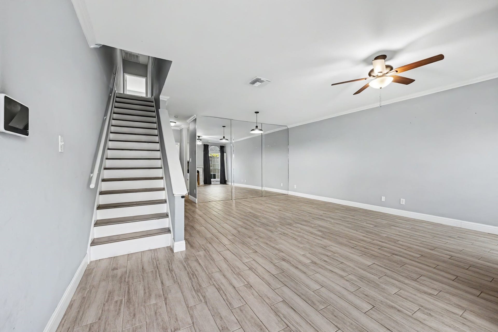 4001 Tanglewilde Street, #712, Houston, TX 77063 View Into Living and Dining Area as You Step in Through the Front Door