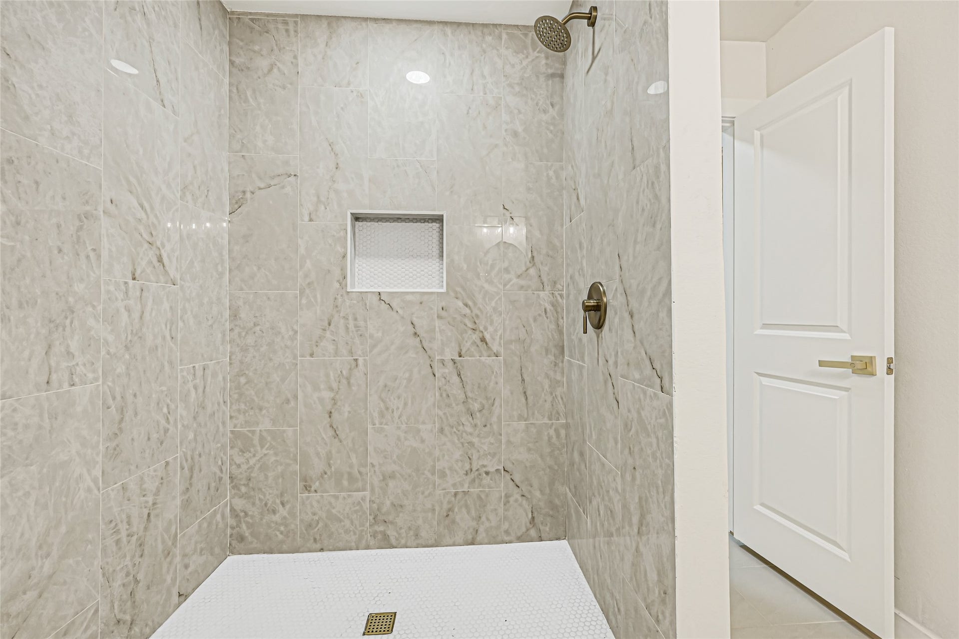 11102 Sagecanyon Drive, Houston, TX 77089 Second primary bathroom featuring a beautifully tiled walk-in shower.