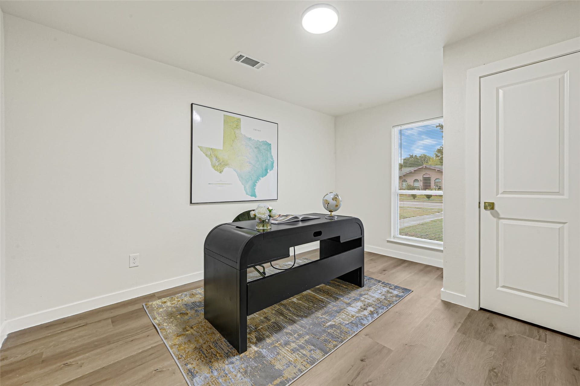 11102 Sagecanyon Drive, Houston, TX 77089 Versatile bedroom currently staged as a home office, offering the flexibility to create a workspace, guest room, or additional bedroom to suit your needs.