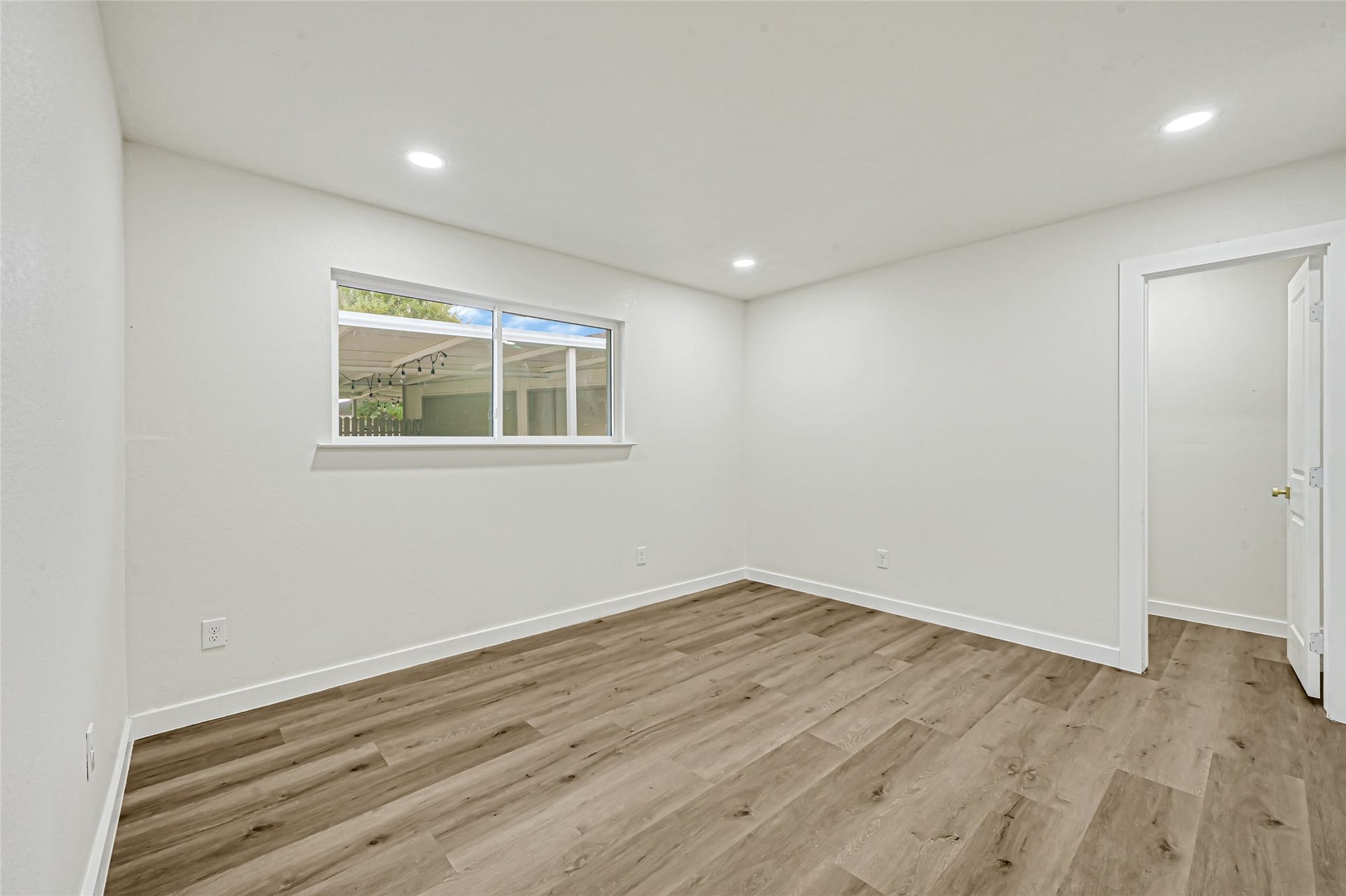 11102 Sagecanyon Drive, Houston, TX 77089 Second primary suite featuring updated flooring, recessed lighting, and a private bathroom