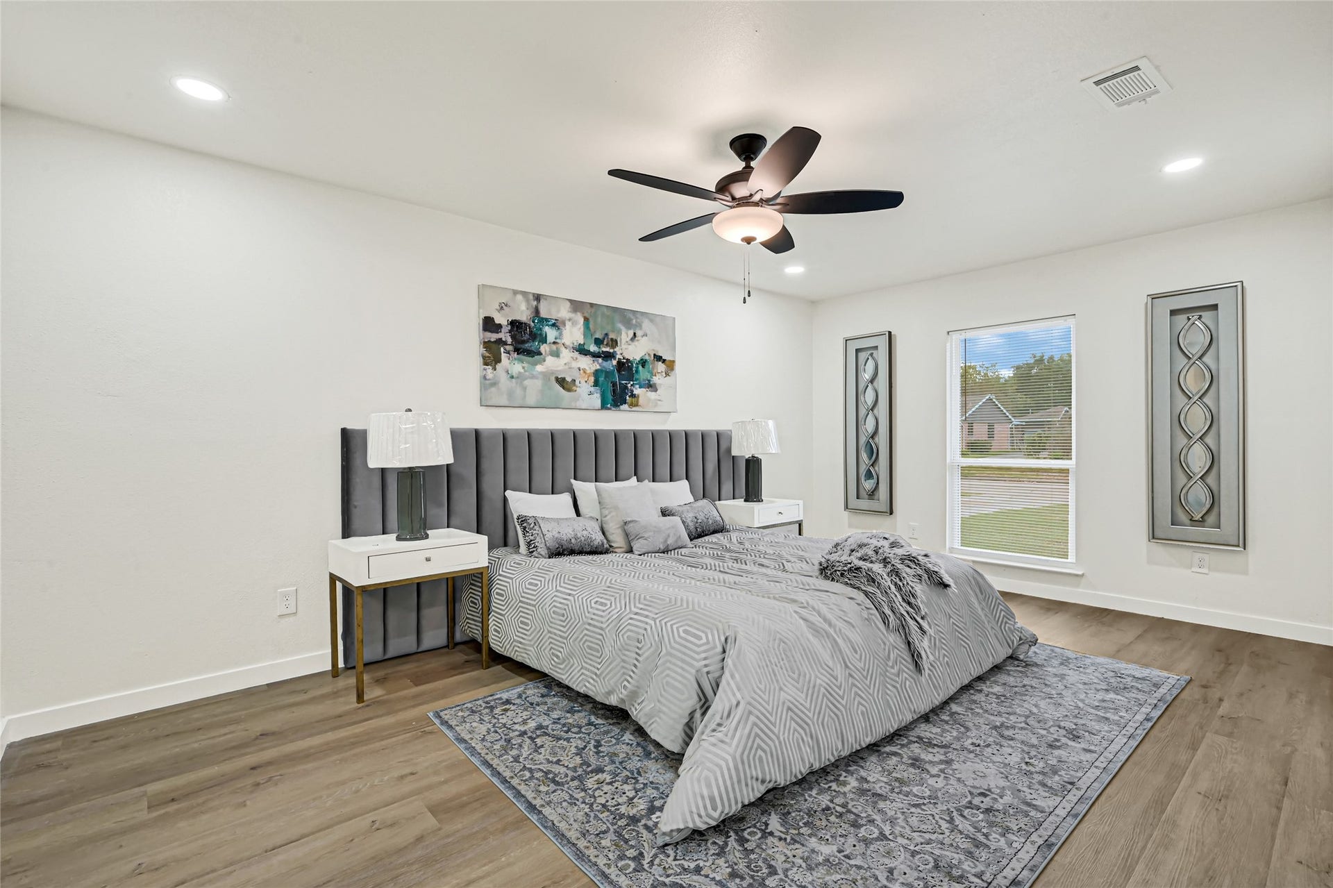 11102 Sagecanyon Drive, Houston, TX 77089 Spacious primary suite featuring modern finishes, updated flooring, and abundant natural lighting.