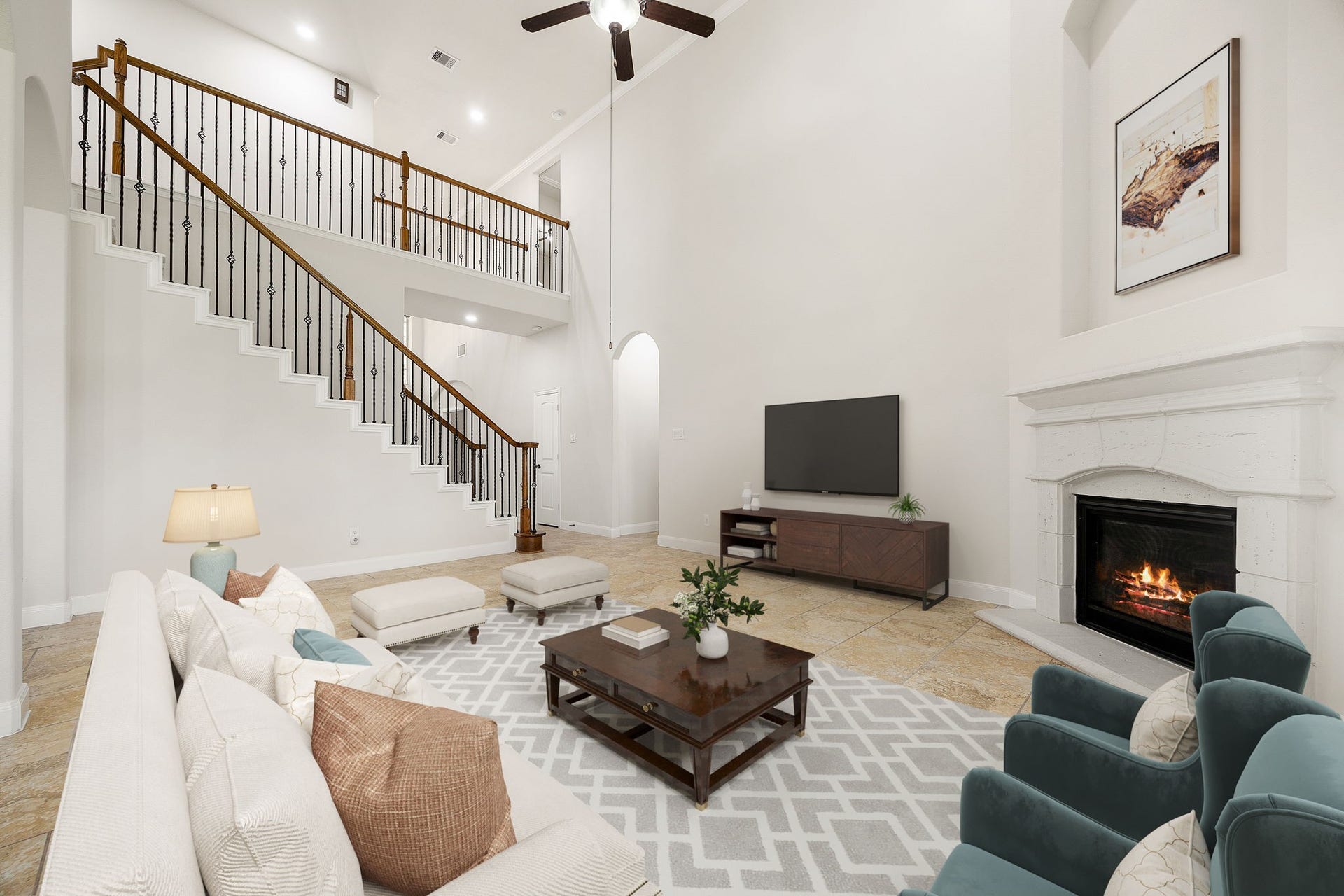 9931 Hutton Park Drive, Katy, TX 77494 This breathtaking, double-height living room features an expansive wall design that pairs beautifully with a stately, classic mantle fireplace. A dramatic, wide staircase with a wrap-around upper gallery frames the soaring ceilings, creating an airy and sophisticated atmosphere. Perfect for making a lasting impression, this open and light-filled layout effortlessly connects the home's primary living zones.