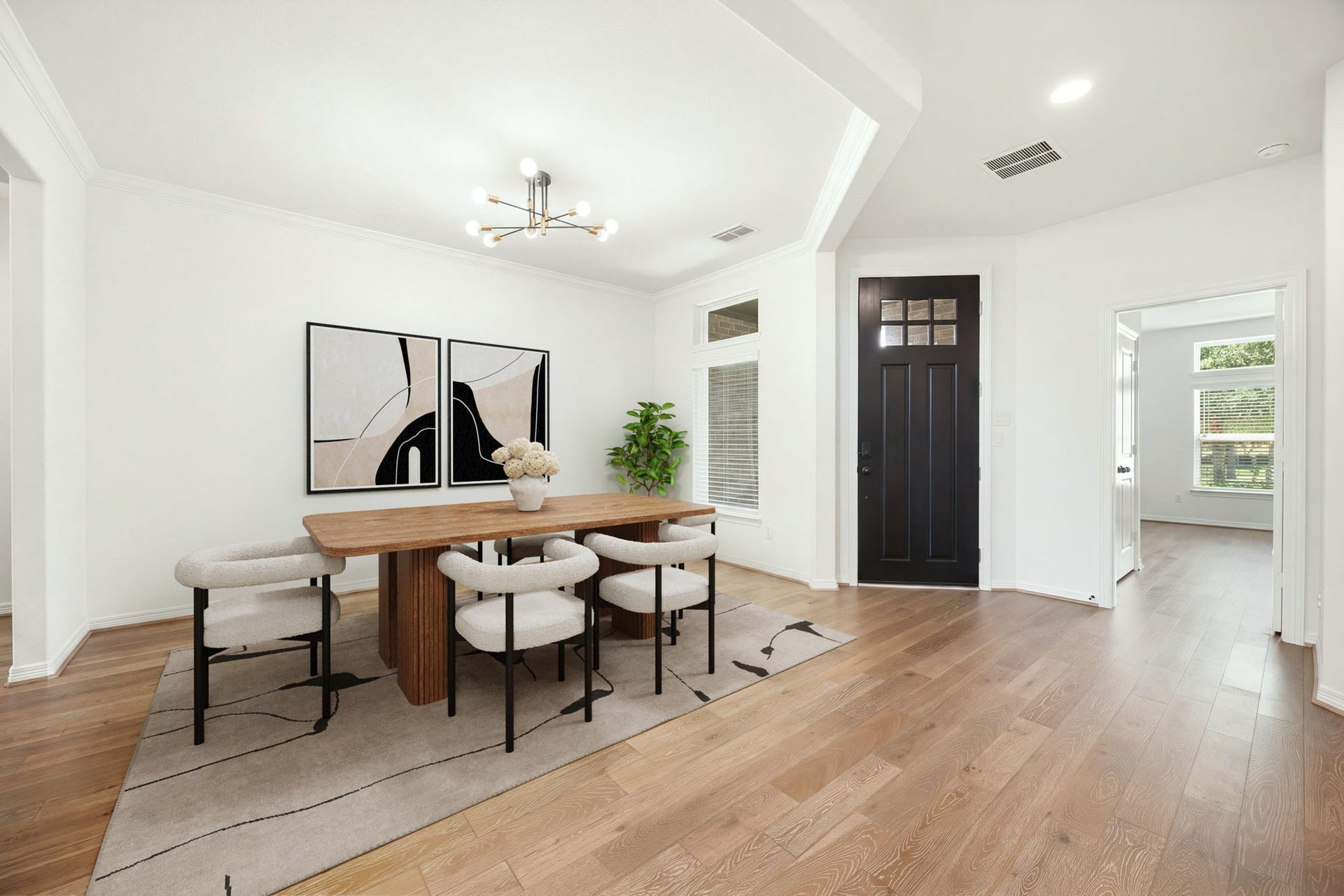 30715 Parkside Passage Drive, Fulshear, TX 77441 The expansive entry not only flows directly into the formal dining room but also to the first floor guest suite. *Virtually Staged
