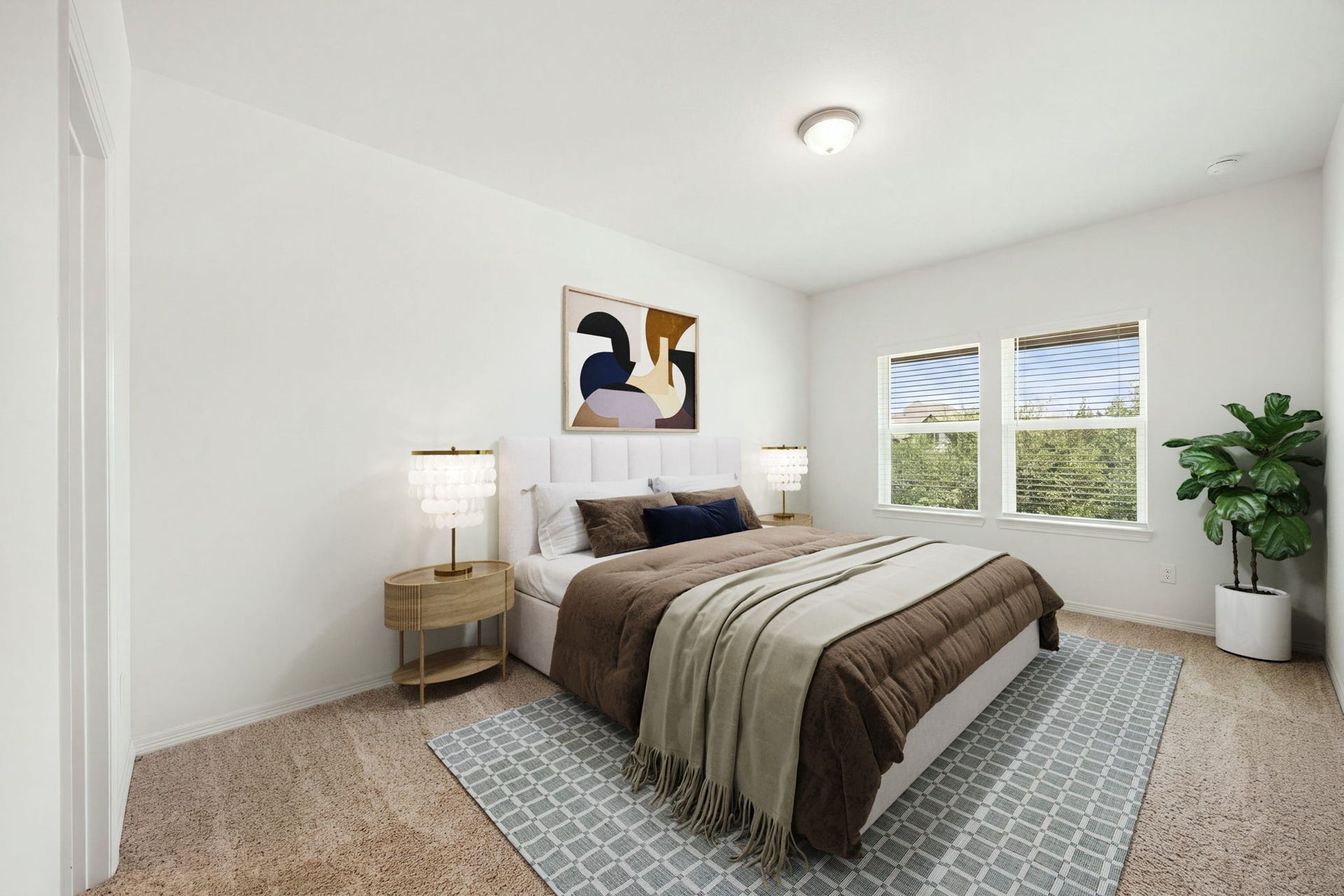 30715 Parkside Passage Drive, Fulshear, TX 77441 This bright and spacious upstairs secondary bedroom offers a comfortable retreat, featuring crisp white walls and soft neutral carpeting. A large pair of side-by-side windows allows for abundant natural light while framing pleasant views of the property's surroundings. *Virtually Staged