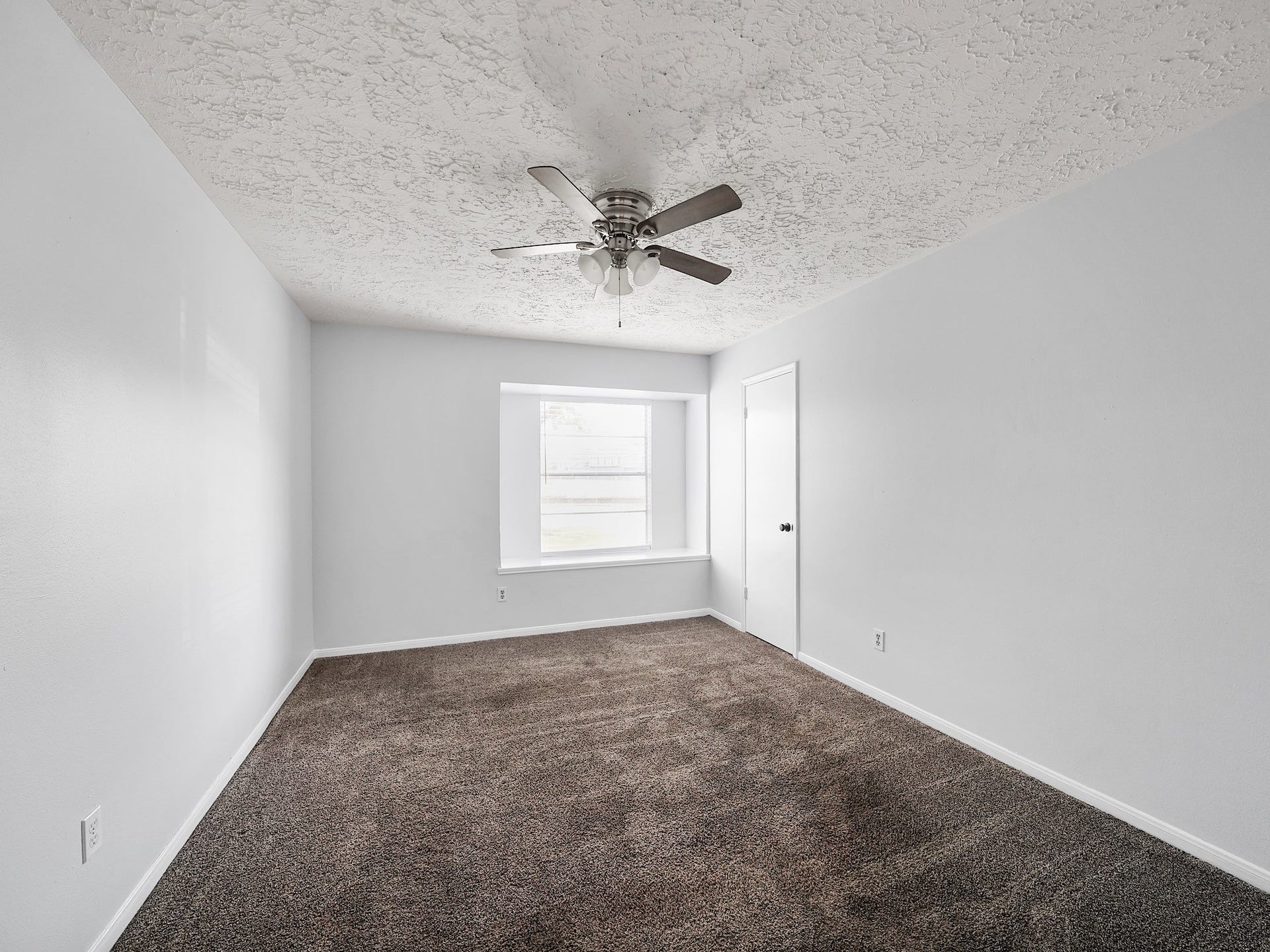 48 Chapparal Court, Missouri City, TX 77459 Bedroom with fresh paint and steam cleaned carpets. Lots of natural light.