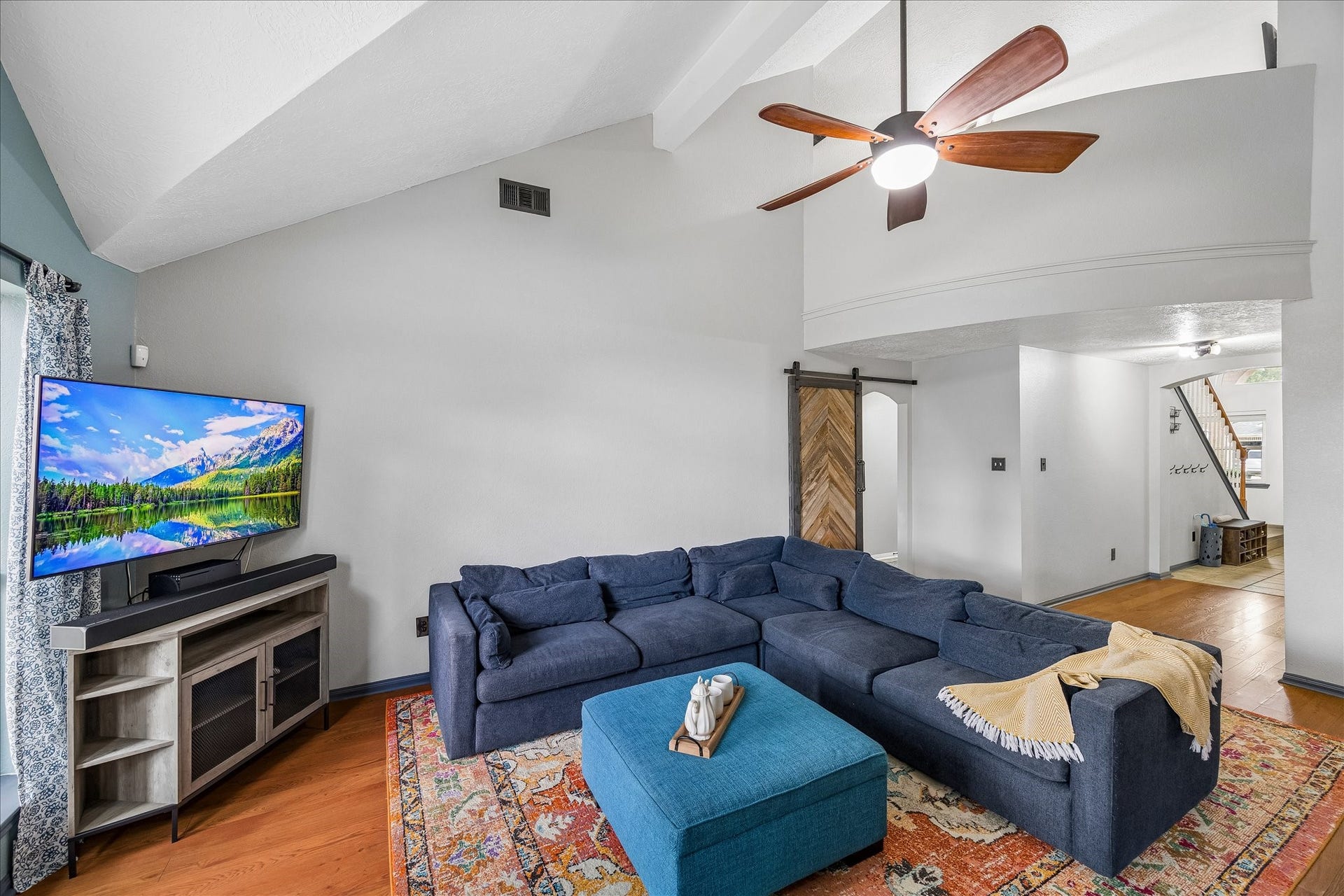 1918 Mercoal Drive, Spring, TX 77386 The living is bathed in lighting from the 3 large windows