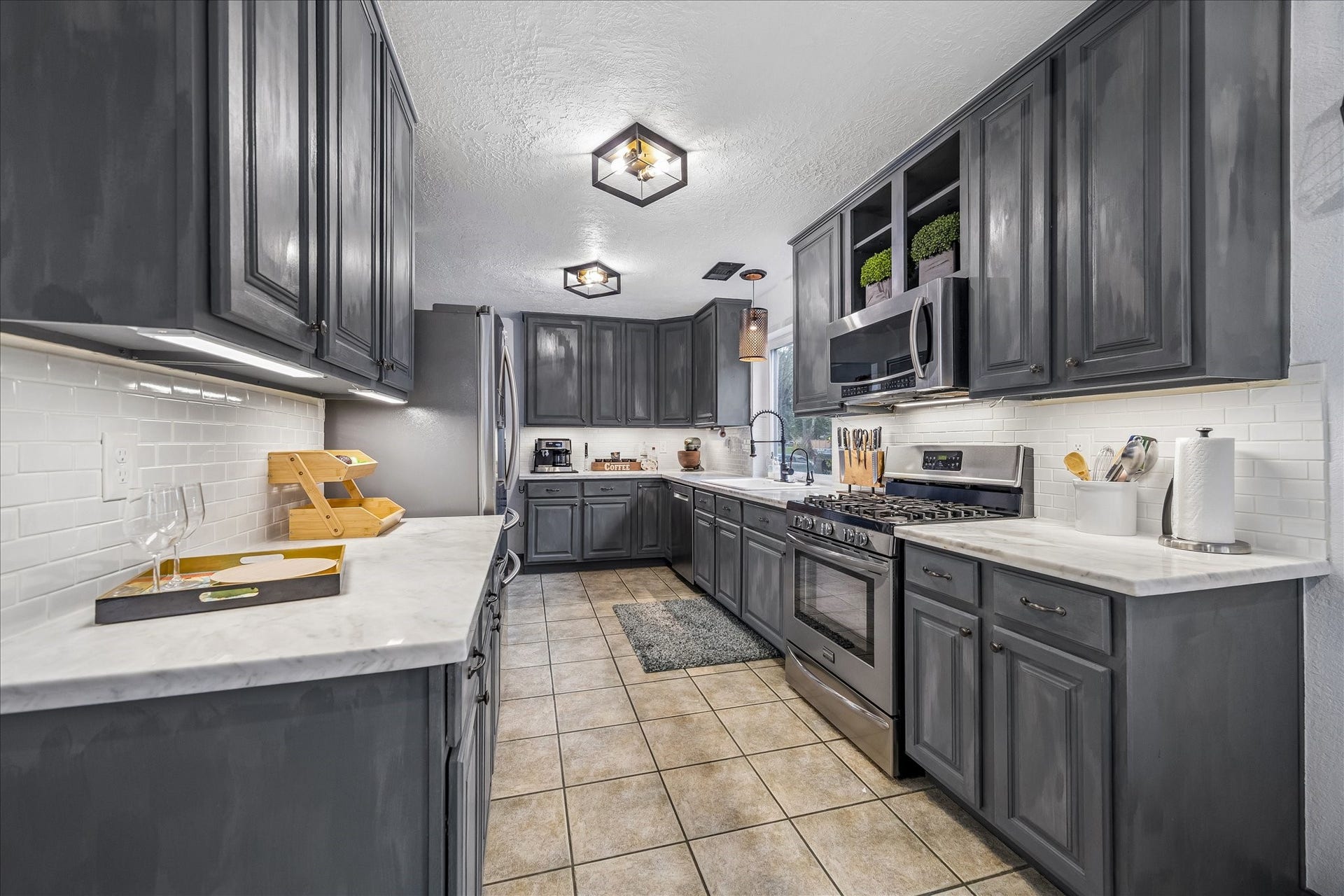 1918 Mercoal Drive, Spring, TX 77386 Granite countertops, custom cabinets & great lighting
