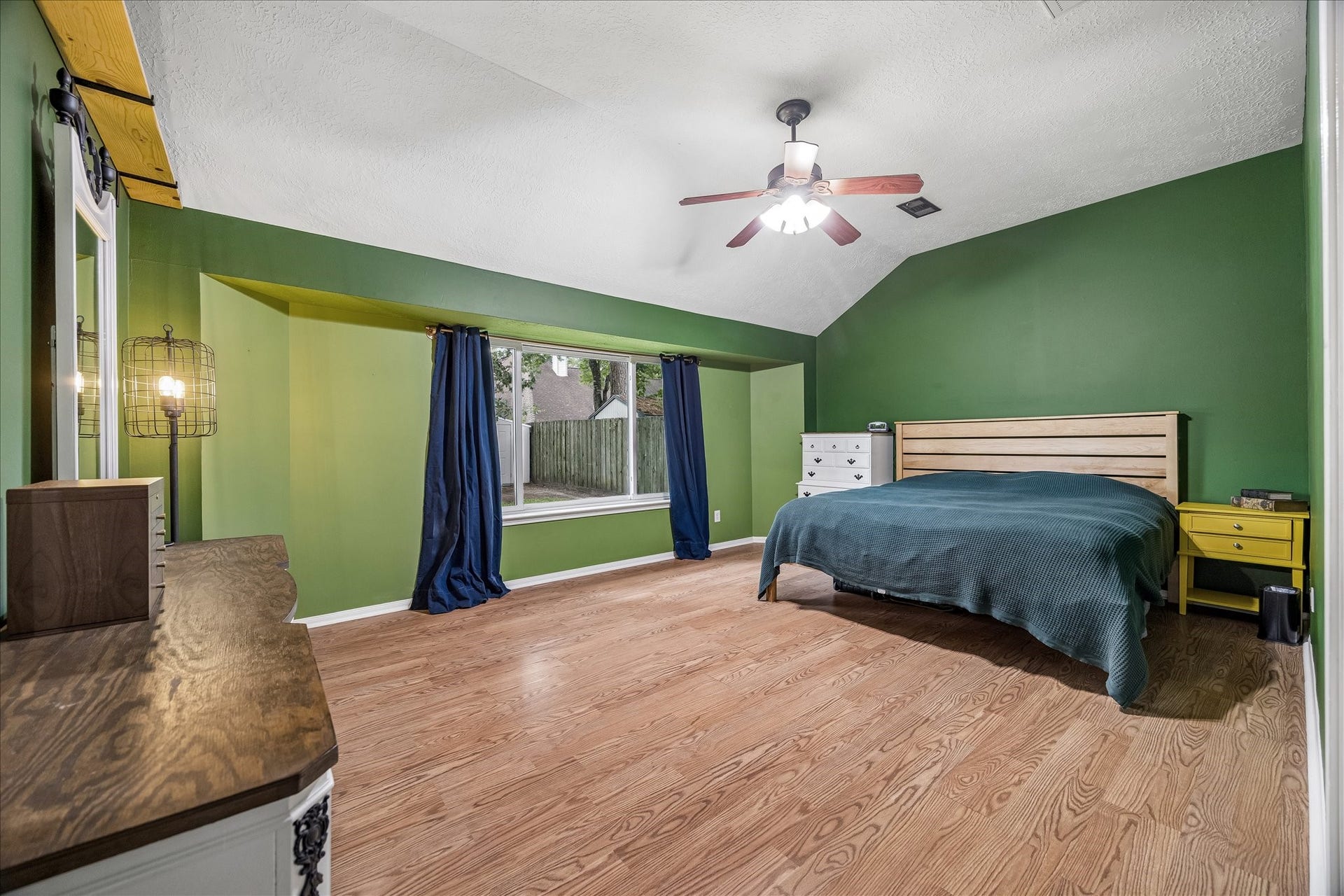 1918 Mercoal Drive, Spring, TX 77386 Primary bedroom has large picture window to backyard