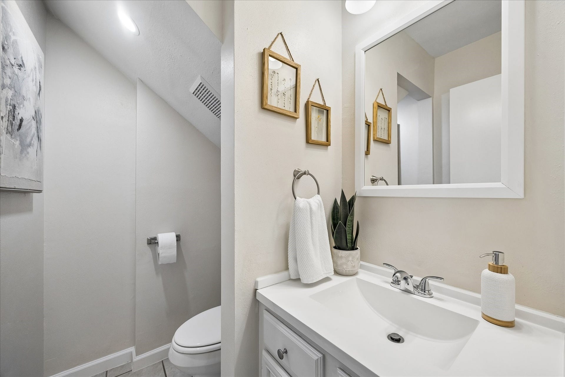 A convenient, and recently renovated, powder room on the first floor.