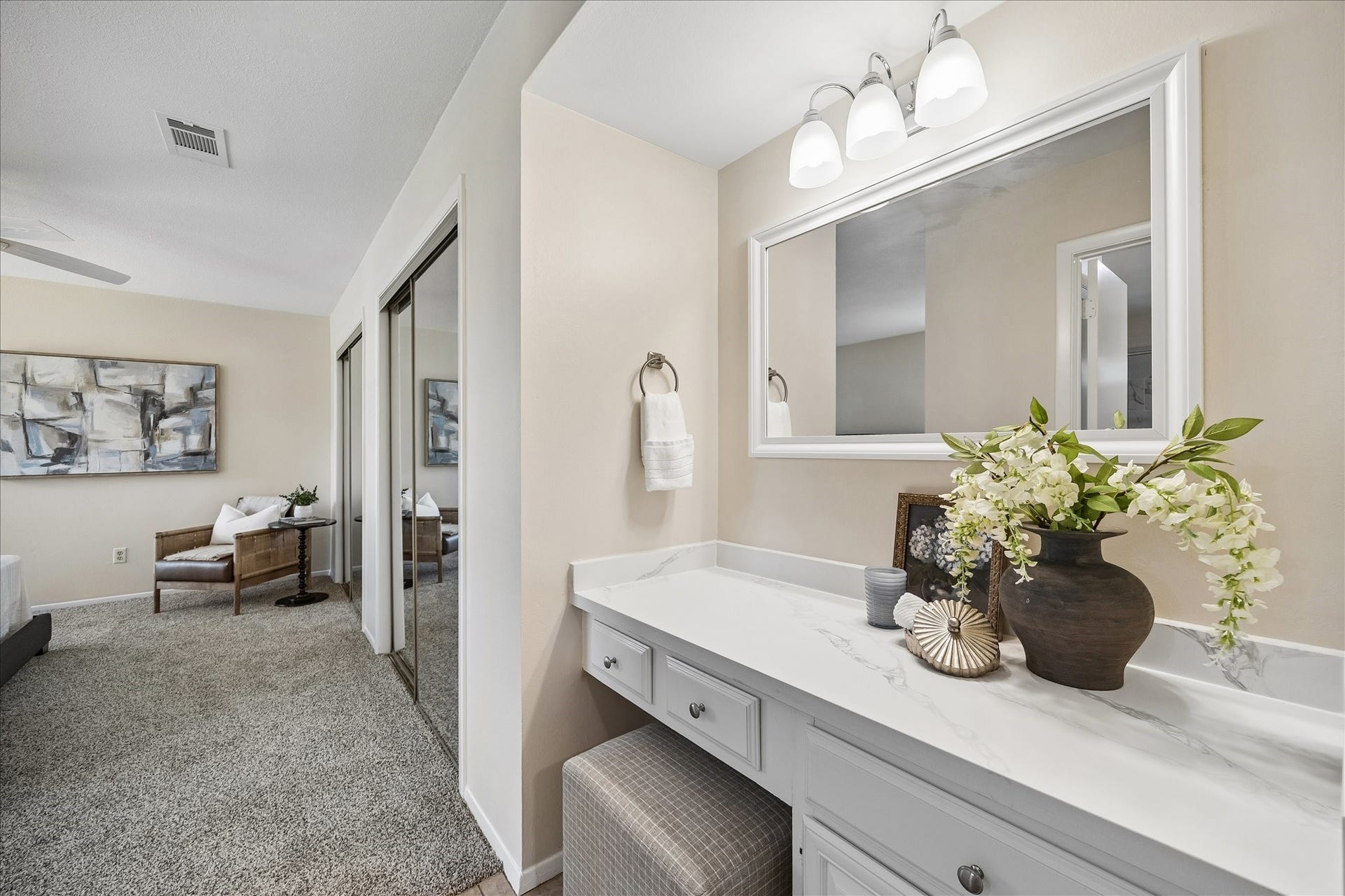 The primary retreat includes double closets and a vanity area.