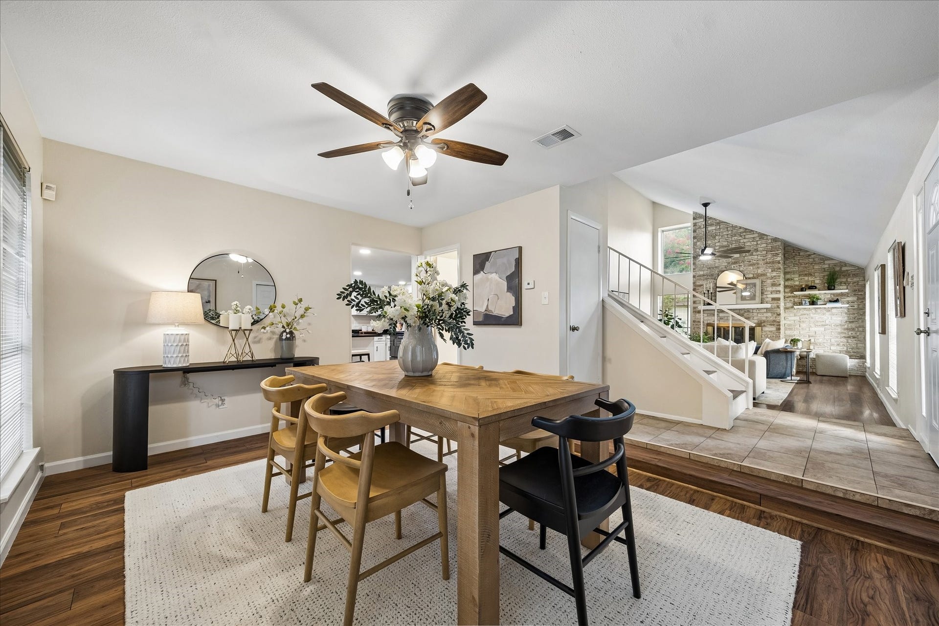 A large formal dining room that flows between the kitchen and living area.