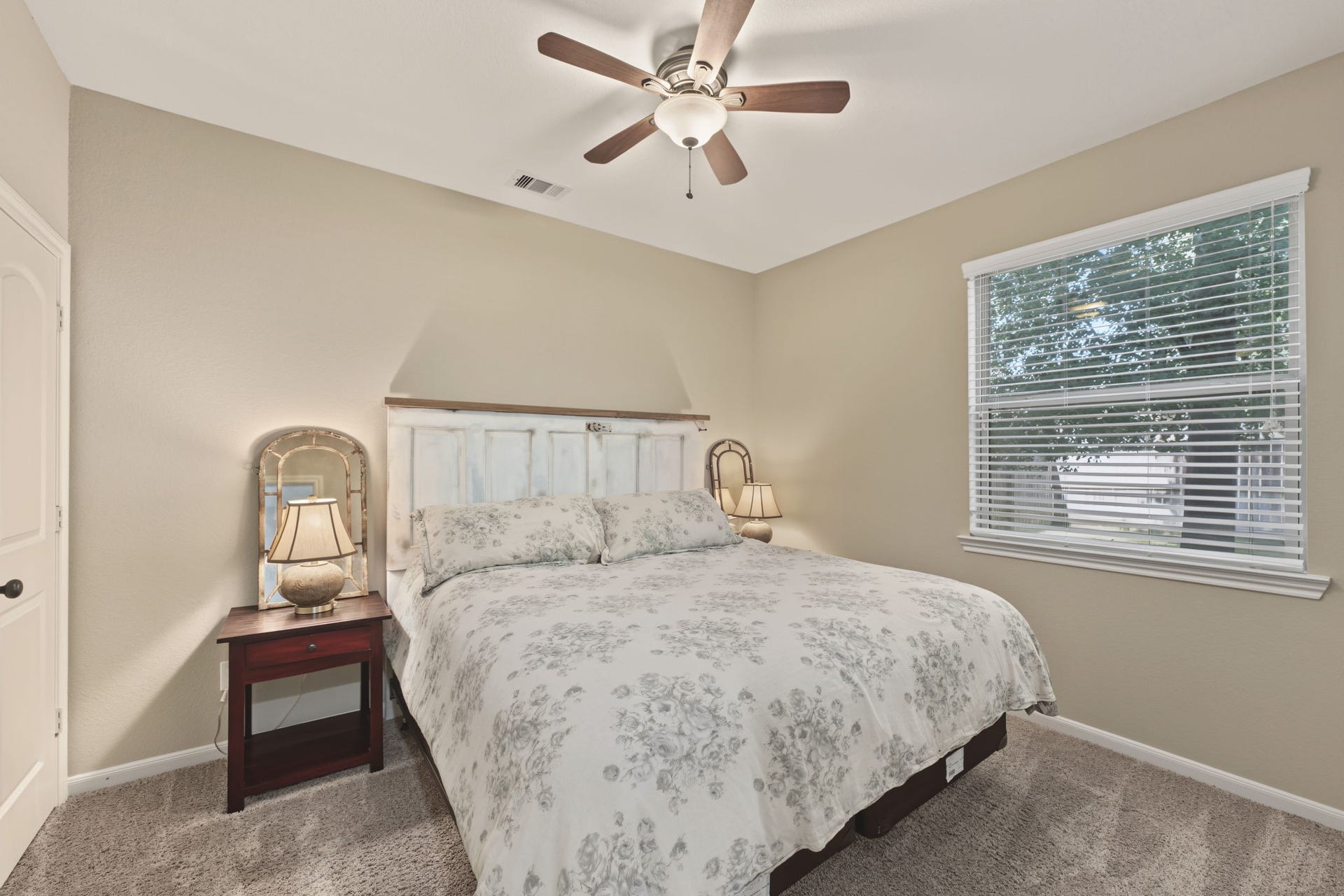 178 Biltmore Loop, Montgomery, TX 77316 Unwind in this peaceful bedroom that is at the rear of the home overlooking the backyard . Featuring soft neutral tones, a walk in closet and a window that brings natural light into your personal retreat.