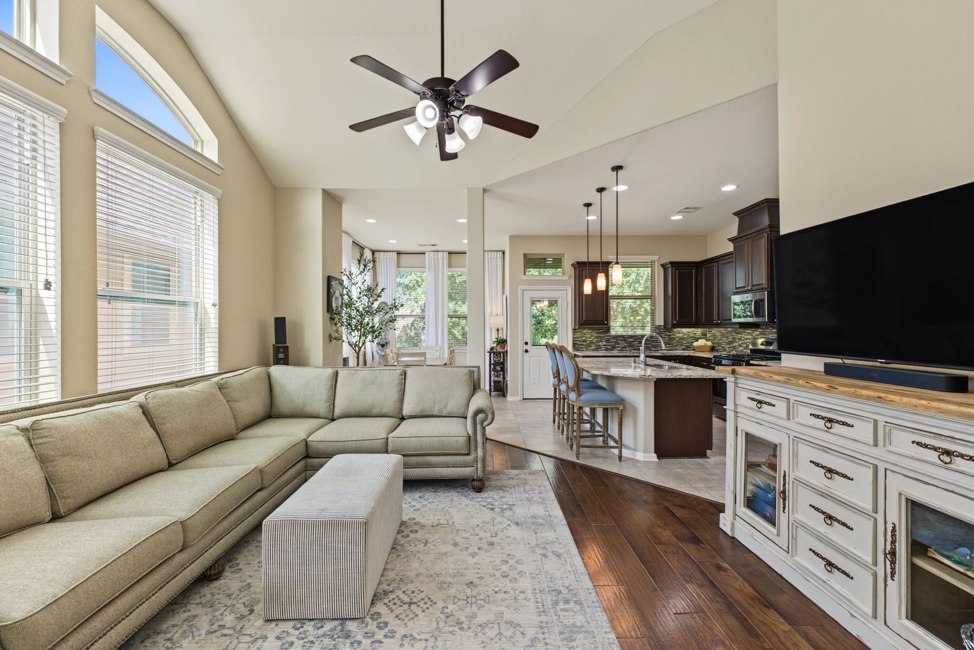 178 Biltmore Loop, Montgomery, TX 77316 A stunning living space where comfort meets style! Relax, entertain, and make unforgettable memories in this inviting open-concept living room.